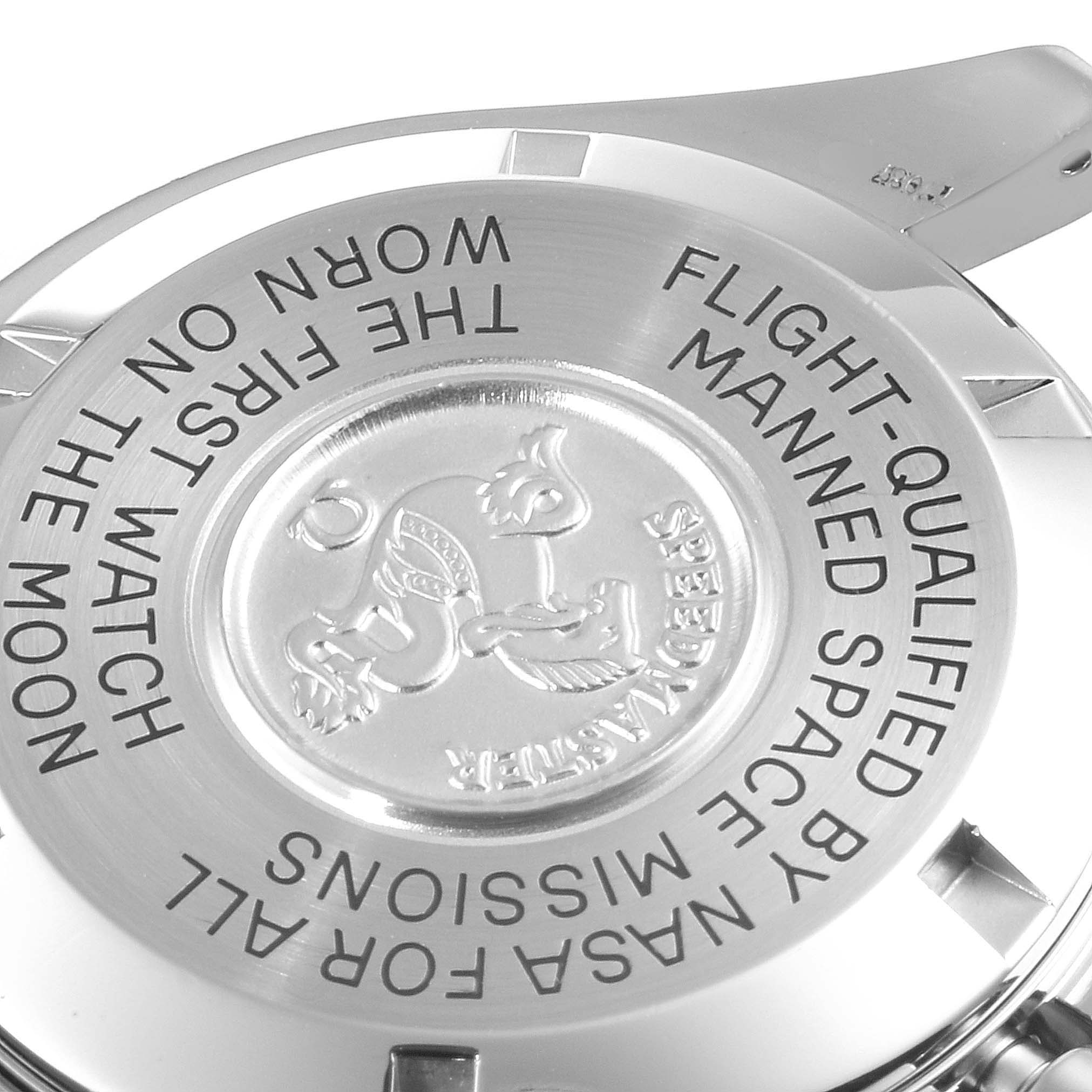 The image shows the back case of an Omega Speedmaster 3570.50.00 Men
s Stainless Steel Black Dial 3570.50.00 Men
s Stainless Steel Black Dial watch, featuring engraved text and the emblem.