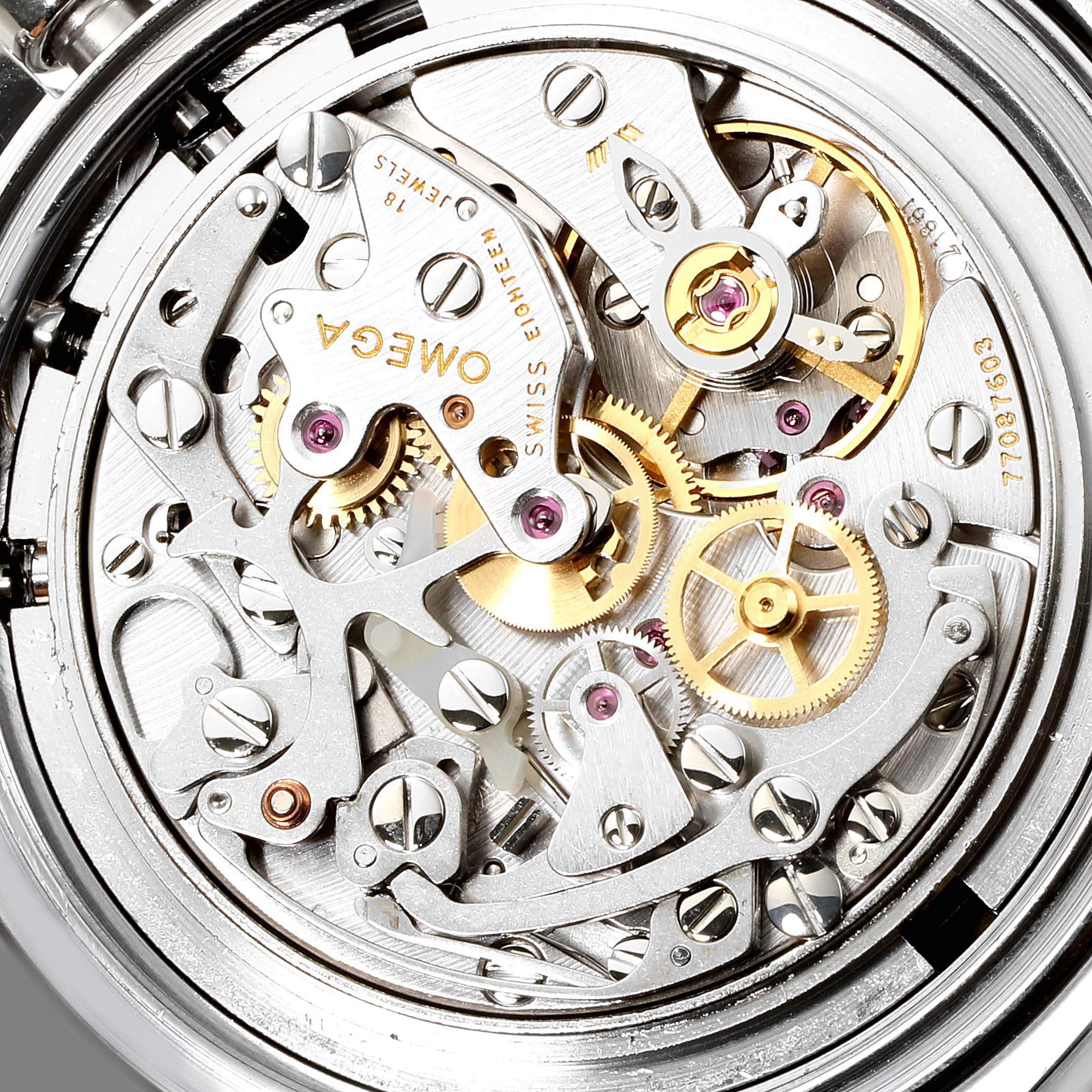 This image shows the intricate mechanics of the Omega Speedmaster 3570.50.00 Men
s Stainless Steel Black Dial 3570.50.00 Men
s Stainless Steel Black Dial watch from a close-up rear angle.