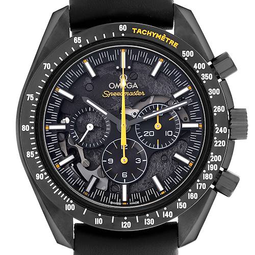 The Omega Speedmaster watch is shown from a front angle, highlighting the face, subdials, and tachymètre bezel.