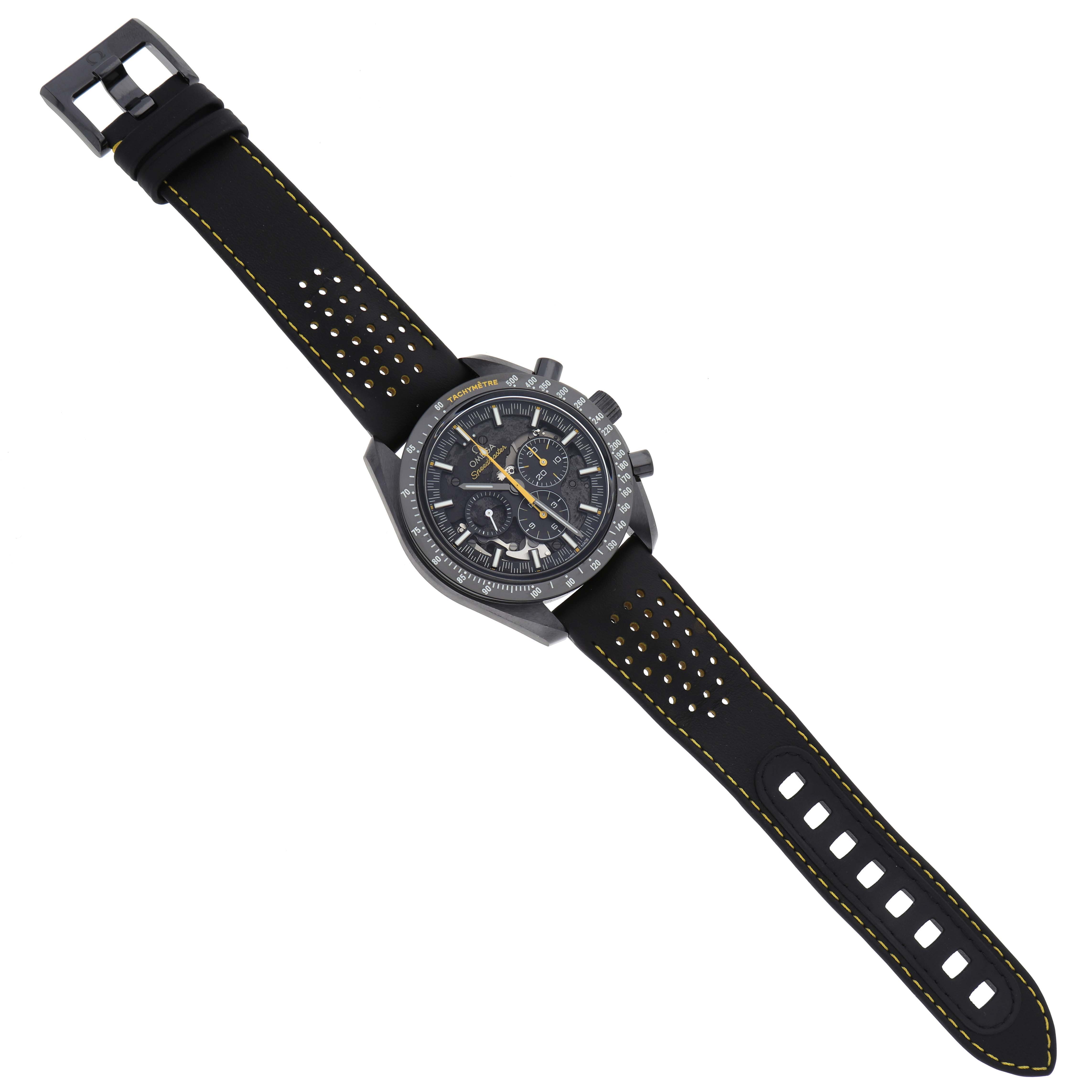 The Omega Speedmaster 311.92.44.30.01.001 Men's Ceramic Black Dial 311.92.44.30.01.001 Men's Ceramic Black Dial watch is shown from a top-down angle, displaying the face, bezel, case, strap, and buckle.