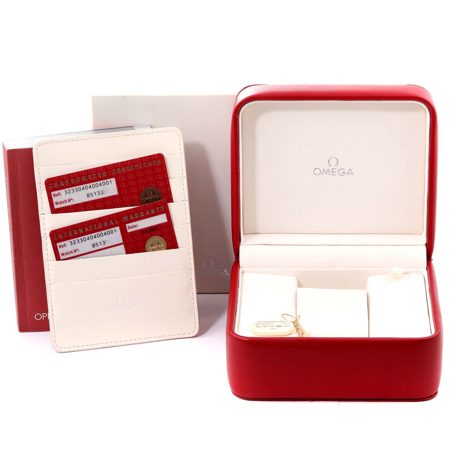 The image shows the packaging, international warranty, and chronometer certificate cards for an Omega Speedmaster 323.30.40.40.04.001 Men's Stainless Steel White Dial 323.30.40.40.04.001 Men's Stainless Steel White Dial watch.