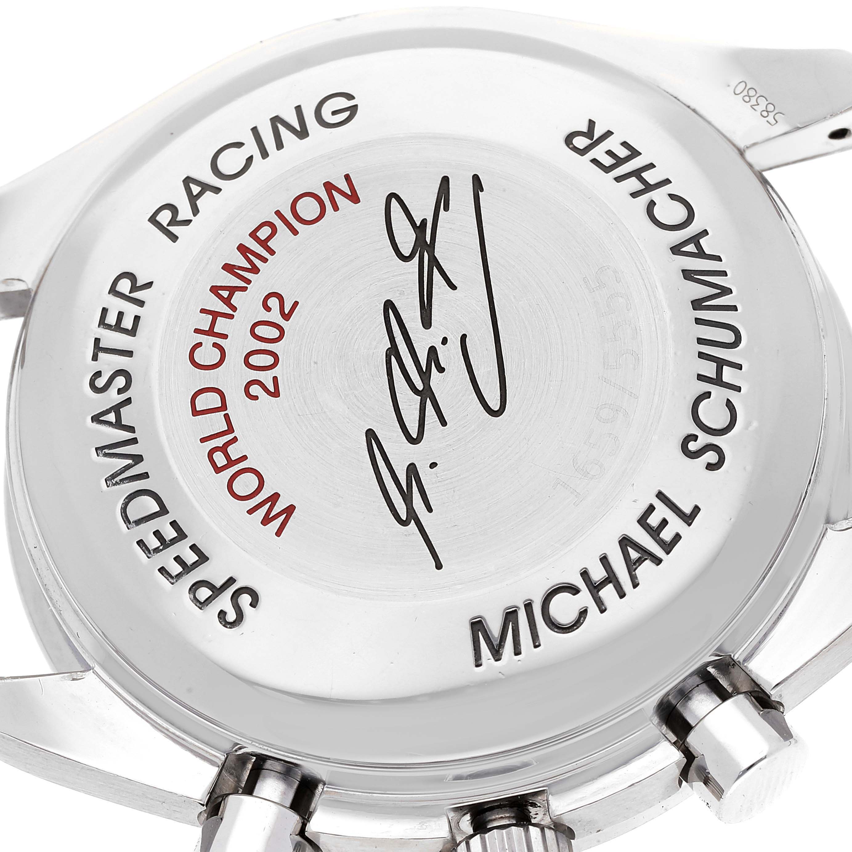 This is a rear view of an Omega Speedmaster 3529.50.00 Men's Stainless Steel Black Dial 3529.50.00 Men's Stainless Steel Black Dial Racing watch, showing the back case with engravings and signatures.