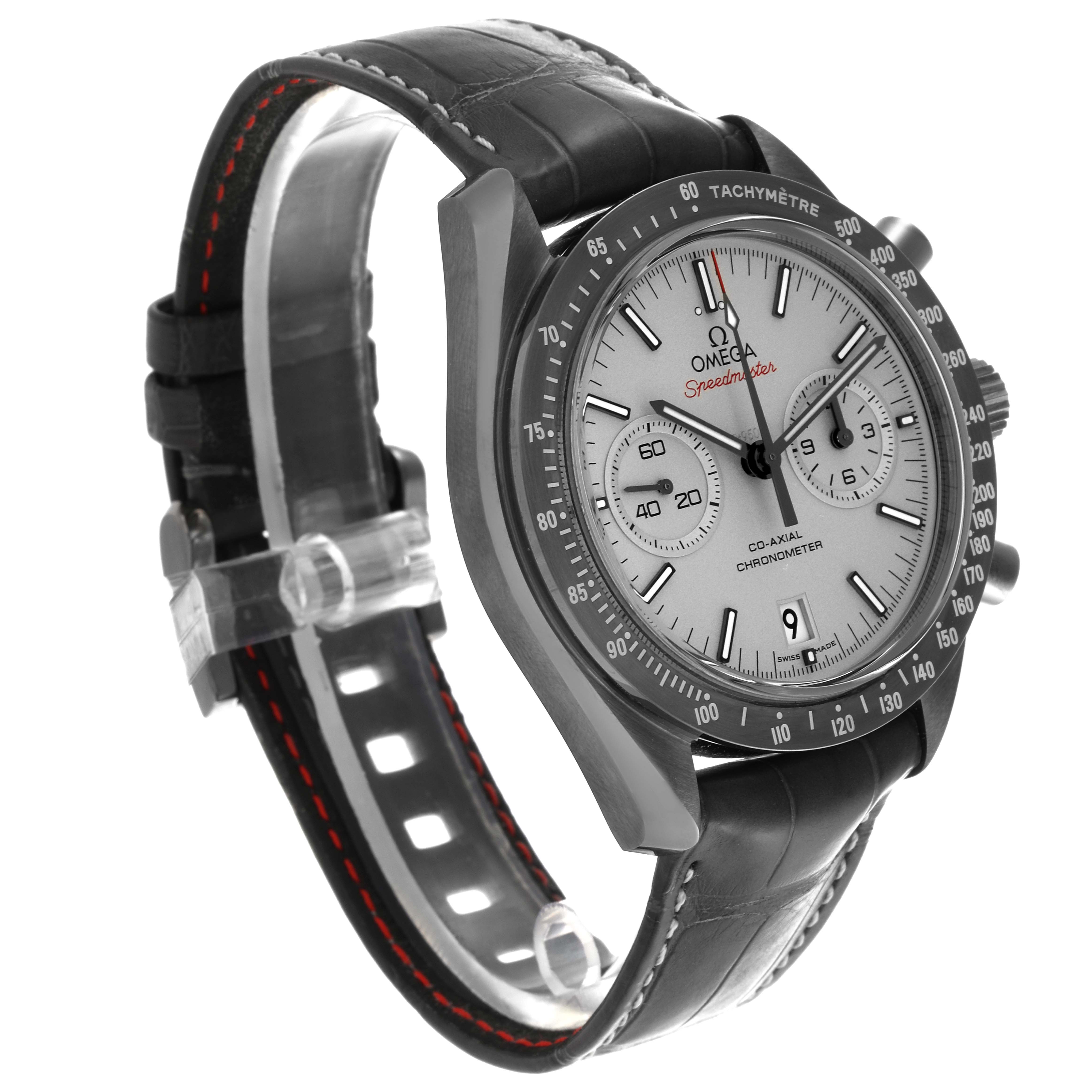 The Omega Speedmaster 311.93.44.51.99.001 Men's Ceramic Silver Dial 311.93.44.51.99.001 Men's Ceramic Silver Dial watch is shown at a three-quarter angle, highlighting its dial, tachymeter bezel, and leather strap.