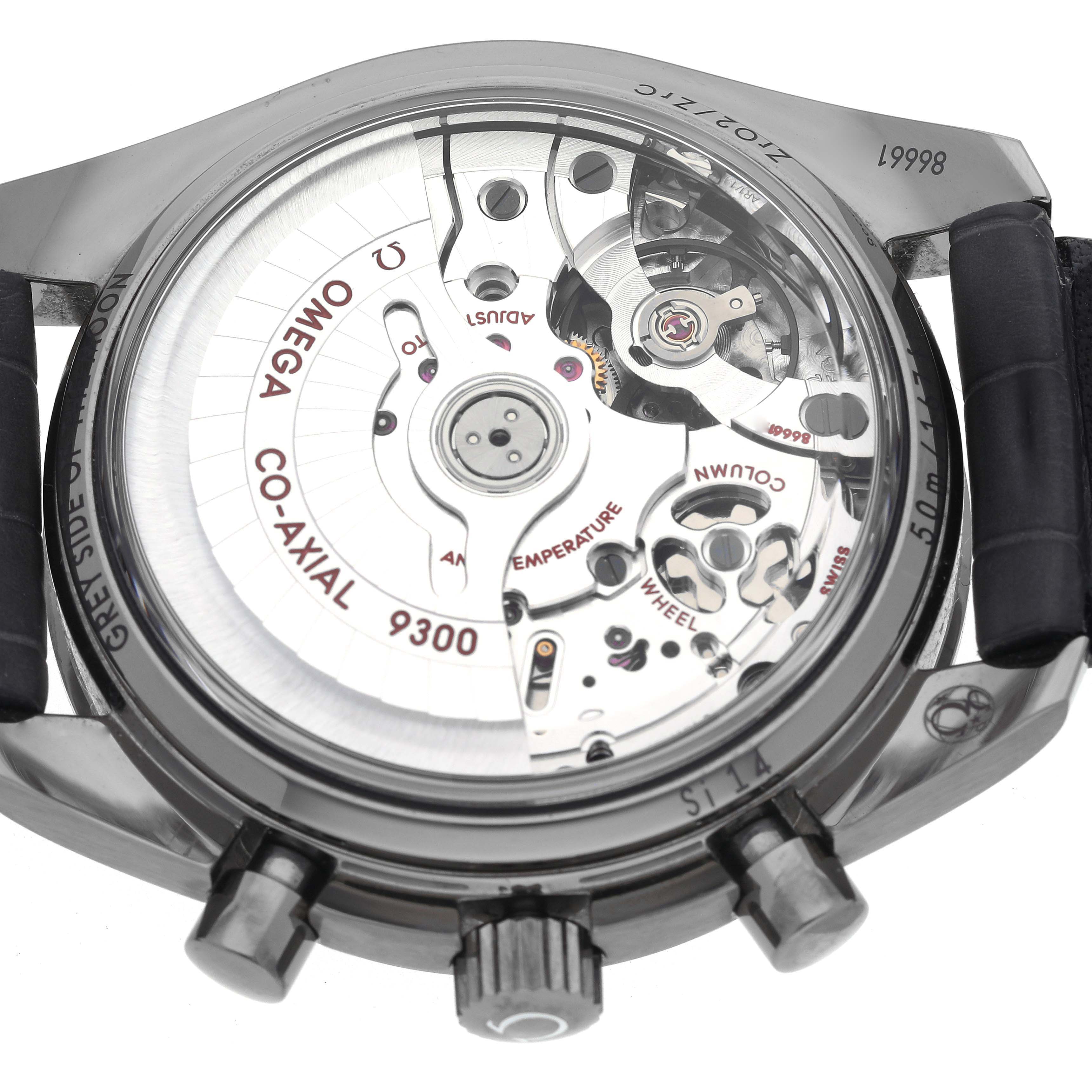 The image shows the back view of the Omega Speedmaster 311.93.44.51.99.001 Men's Ceramic Silver Dial 311.93.44.51.99.001 Men's Ceramic Silver Dial, displaying the Co-Axial 9300 movement and chronograph pushers.