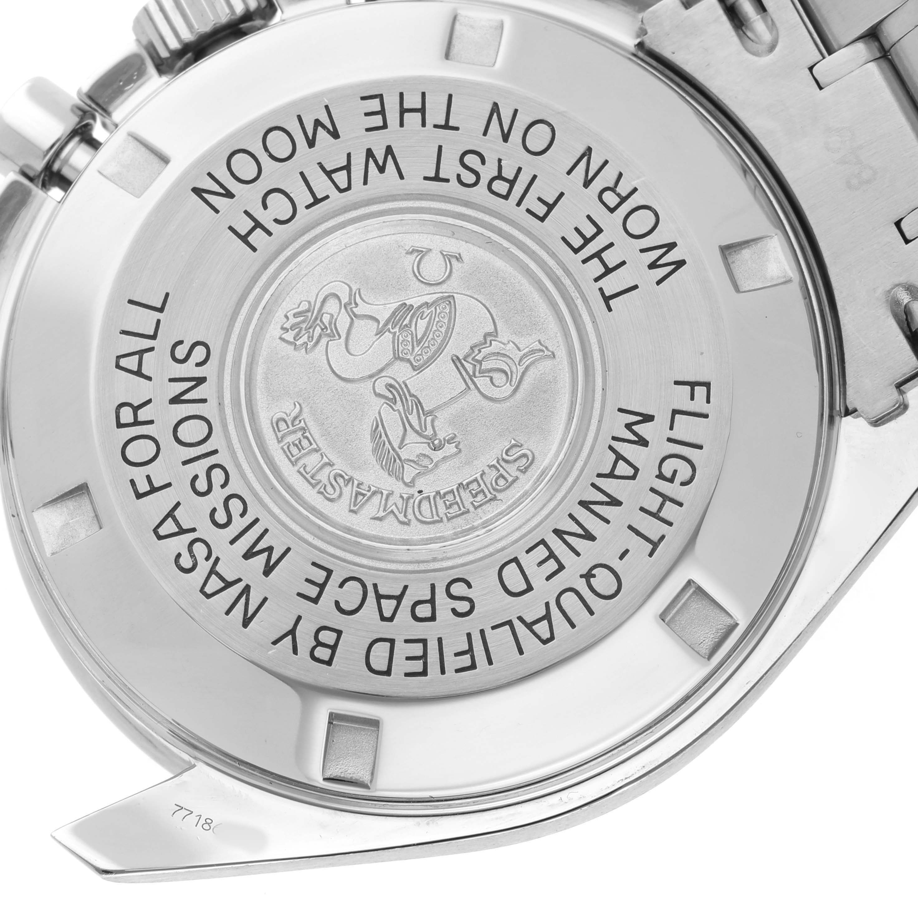 The image shows the back case of an Omega Speedmaster 3570.50.00 Men's Stainless Steel Black Dial, highlighting the engravings and logo.