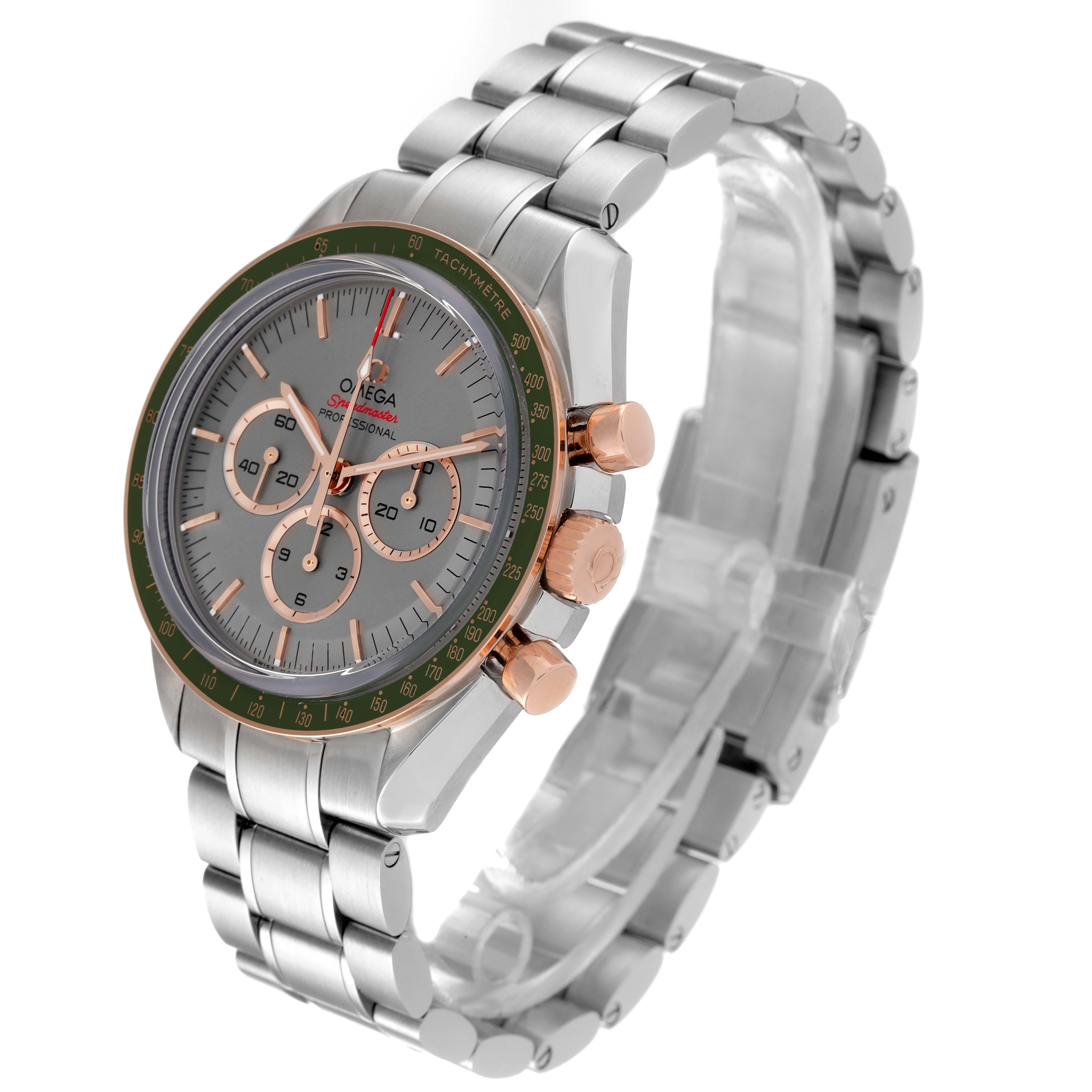 The image shows an Omega Speedmaster 522.20.42.30.06.001 Men's Steel and Gold (two tone) Grey Dial 522.20.42.30.06.001 Men's Steel and Gold (two tone) Grey Dial watch from a three-quarter angle, highlighting its face, bezel, pushers, and bracelet.