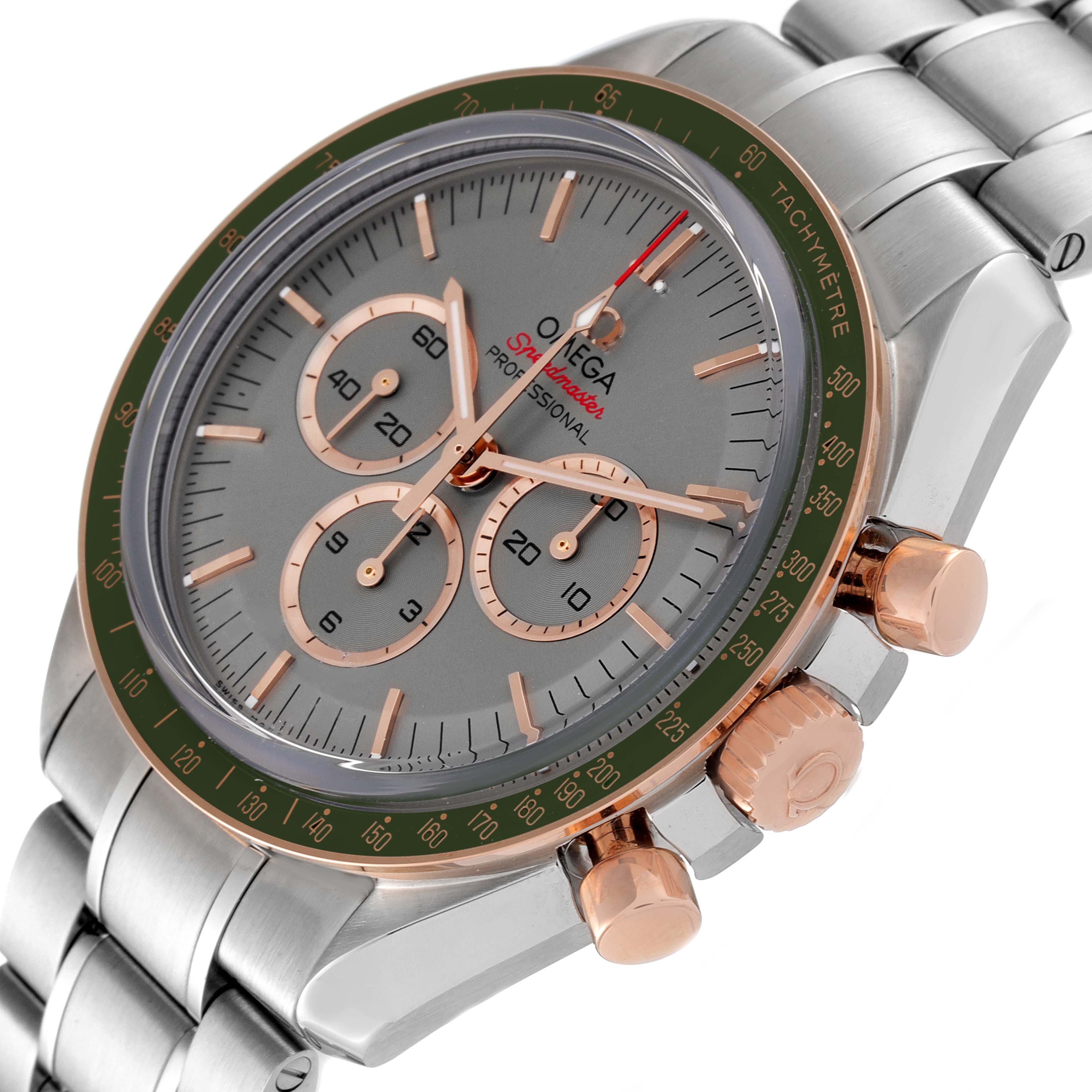 This image shows a close-up of the Omega Speedmaster 522.20.42.30.06.001 Men's Steel and Gold (two tone) Grey Dial 522.20.42.30.06.001 Men's Steel and Gold (two tone) Grey Dial watch face, bezel, and part of the band at an oblique angle.