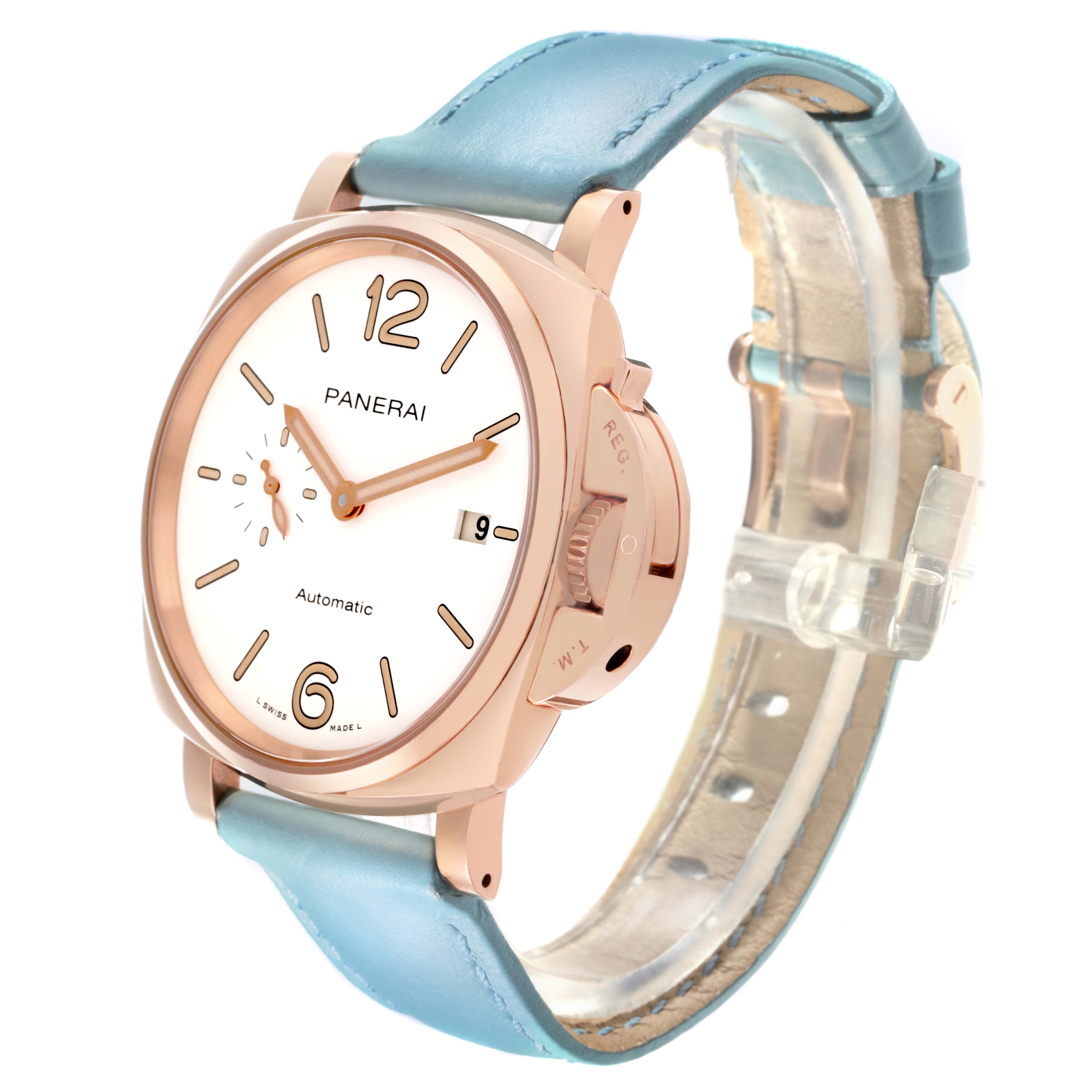 The Panerai Luminor PAM01042 Men's Rose Gold White Dial PAM01042 Men's Rose Gold White Dial watch is shown at a side angle, highlighting its gold-tone case, white dial, crown guard, and light blue leather strap.