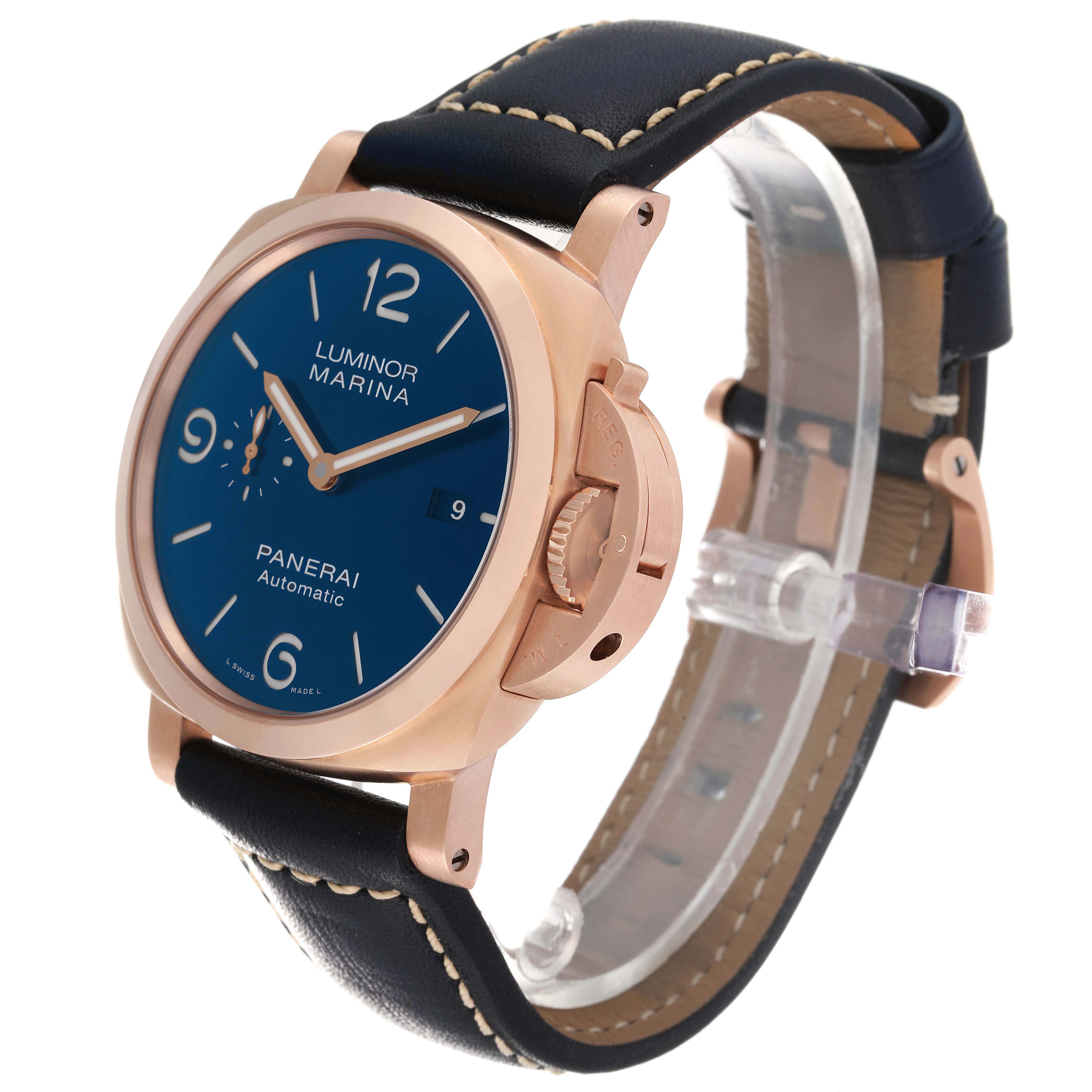 The image shows a Panerai Luminor PAM01112 Men's Rose Gold Blue Dial PAM01112 Men's Rose Gold Blue Dial Marina watch at an angle highlighting the face, crown, and leather strap.