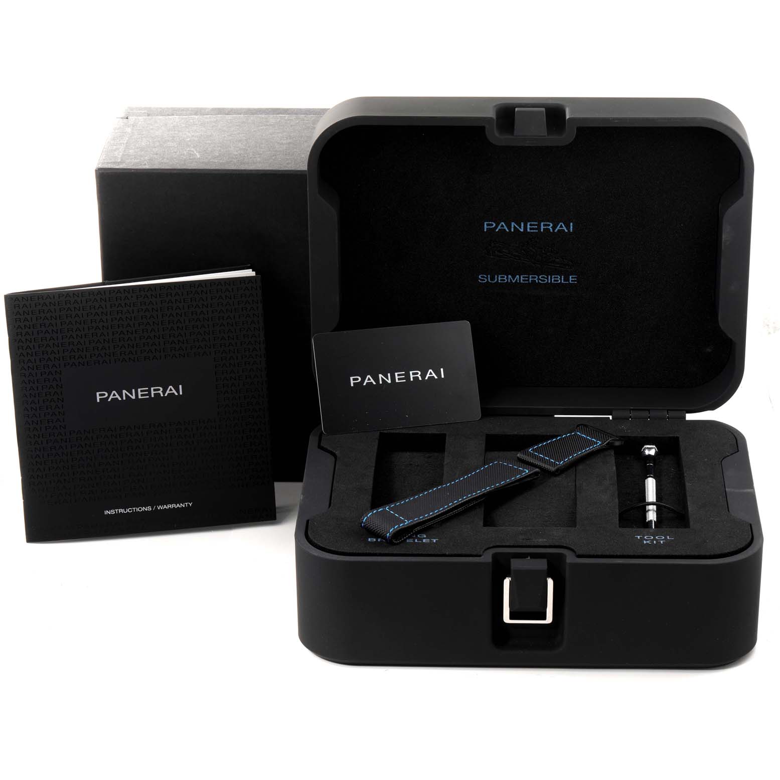 This image shows a Panerai Submersible PAM01616 Men's Ceramic Black Dial PAM01616 Men's Ceramic Black Dial watch box set, including instructions, warranty, strap, and tool kit from a front angle.