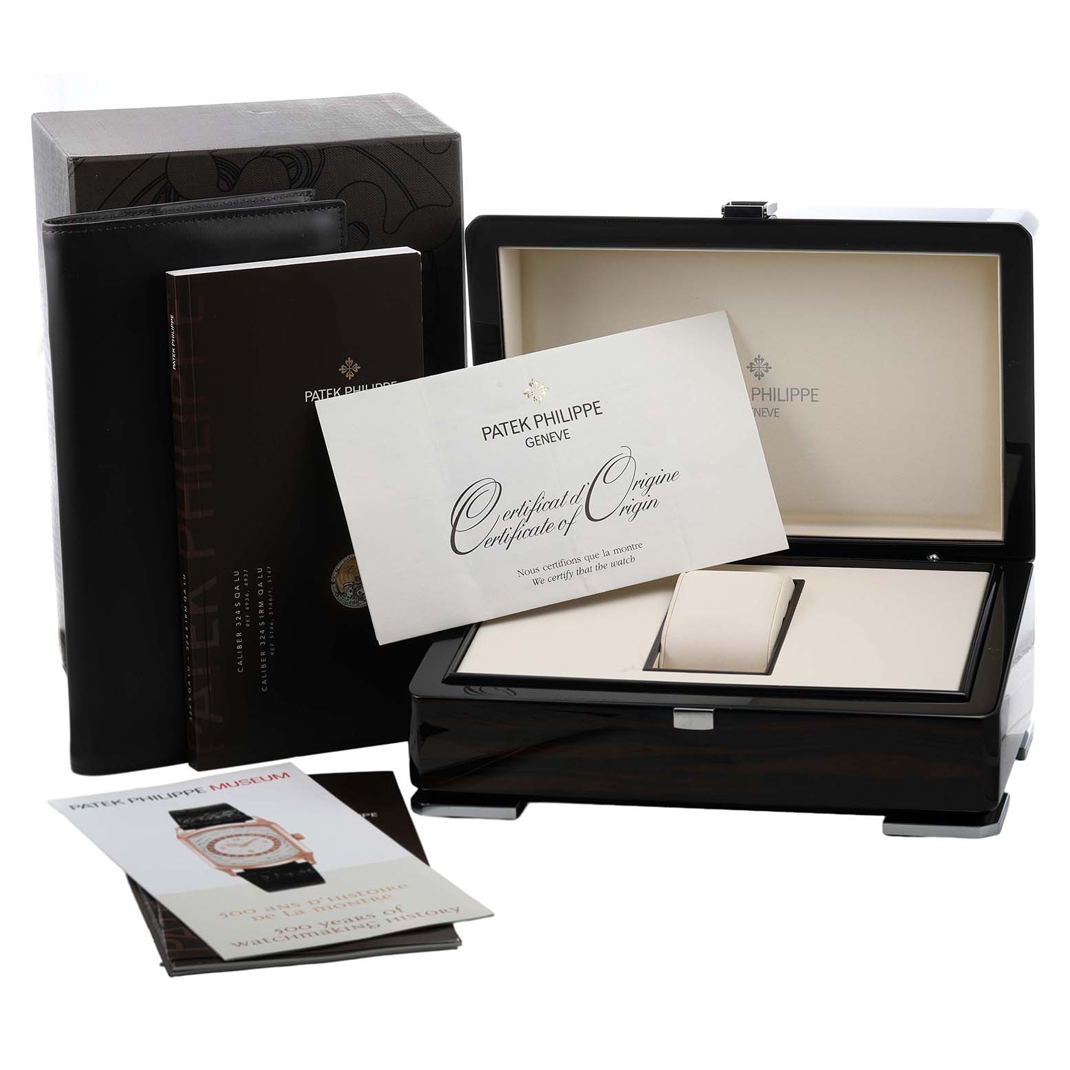 The image shows the packaging and accessories for a Patek Philippe Complications 4936 Men's White Gold Mother of Pearl Dial model, including the box, manuals, and certificate.