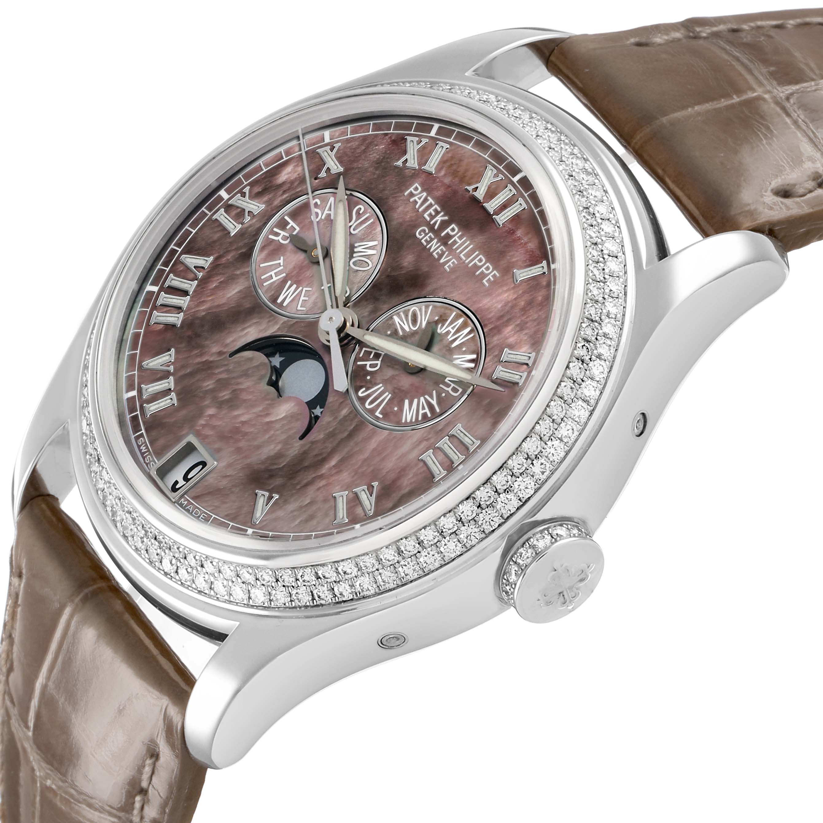 The Patek Philippe Complications 4936 Men's White Gold Mother of Pearl Dial is displayed at a slight angle, showing its dial, crown, brown leather strap, and diamond bezel.