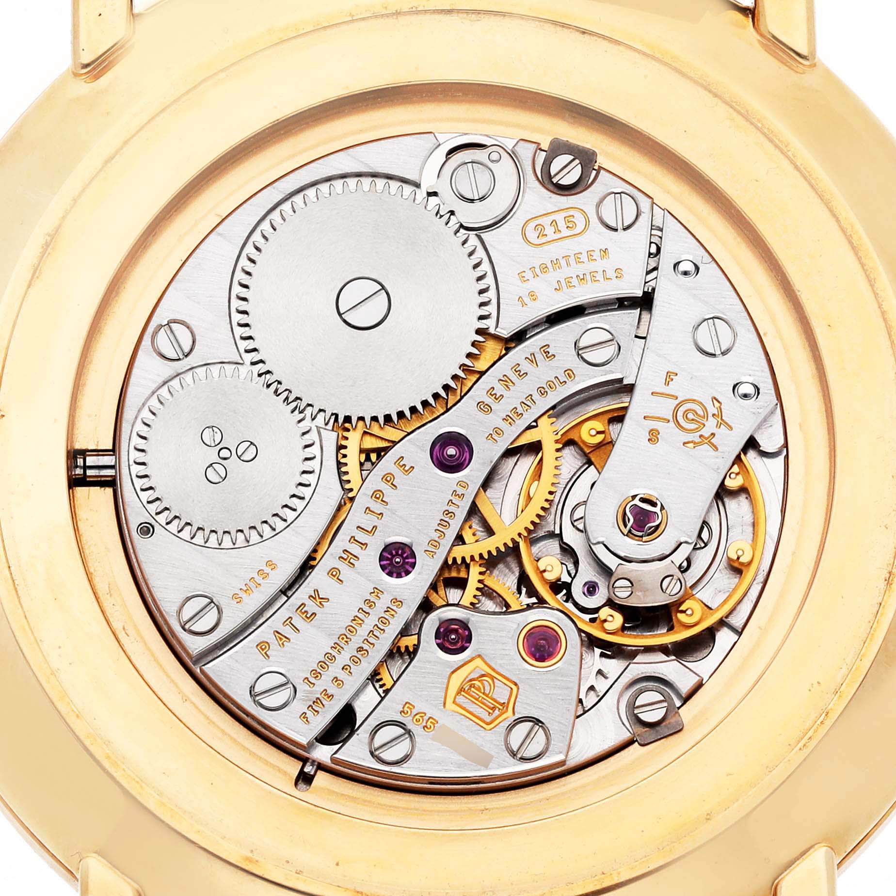 The image shows the intricate back view of the Patek Philippe Calatrava 5119J Men's Yellow Gold White Dial 5119J Men's Yellow Gold White Dial watch, highlighting its mechanical movement and components.