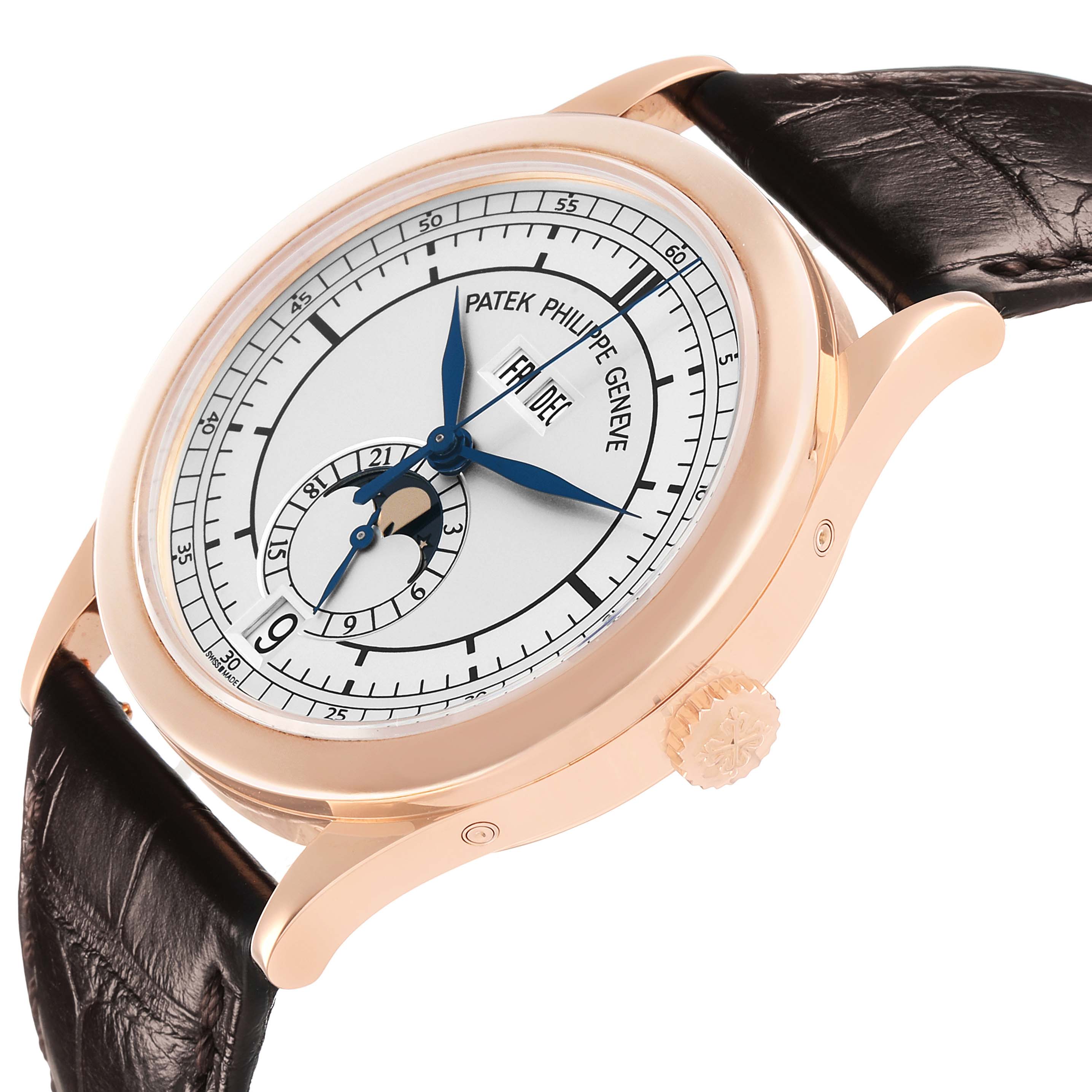 The Patek Philippe Complications 5396R-001 Men's Rose Gold Silver Dial watch is shown at an oblique angle, displaying its dial, crown, and leather strap.