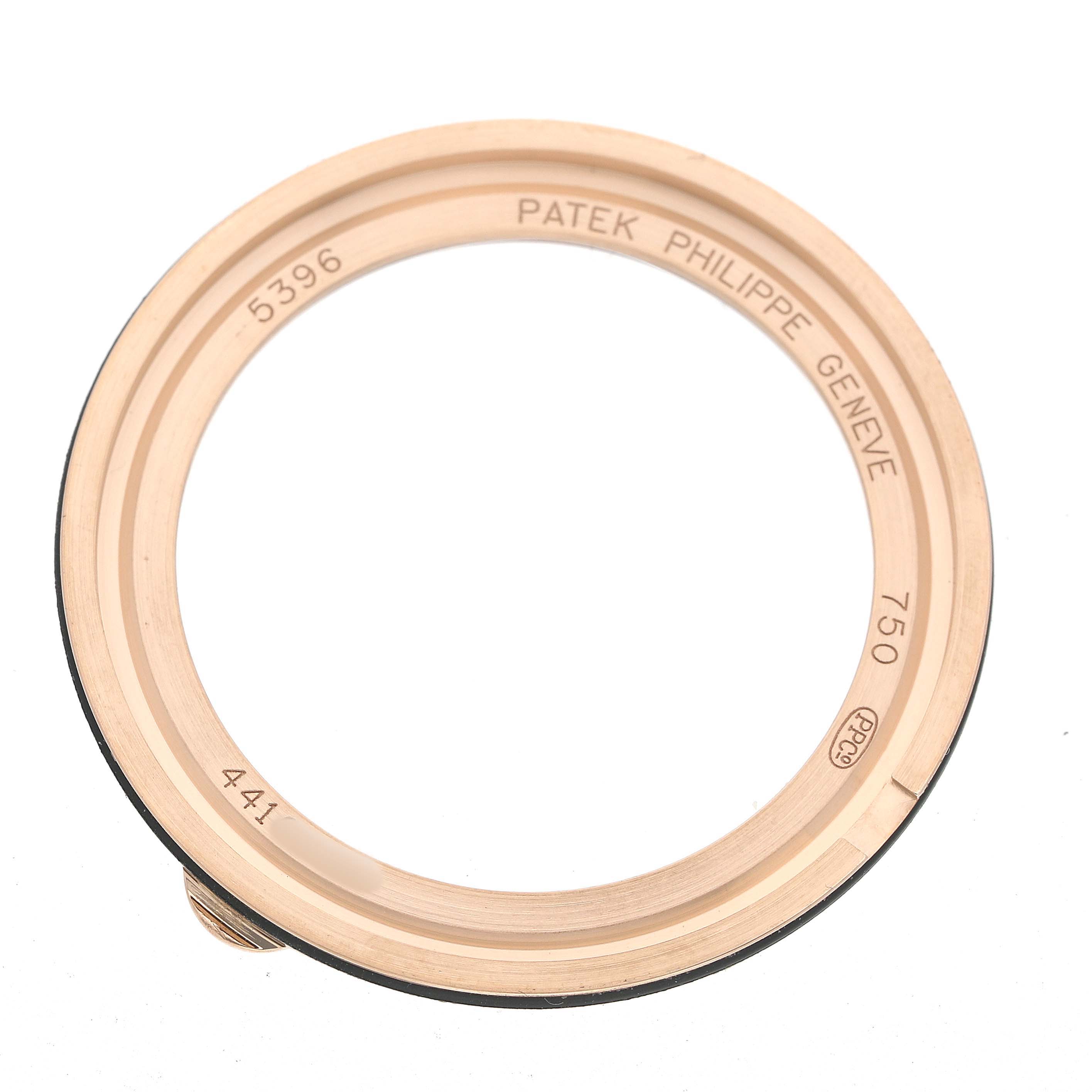 This image shows the bezel for a Patek Philippe Complications 5396R-001 Men's Rose Gold Silver Dial watch, viewed from above.