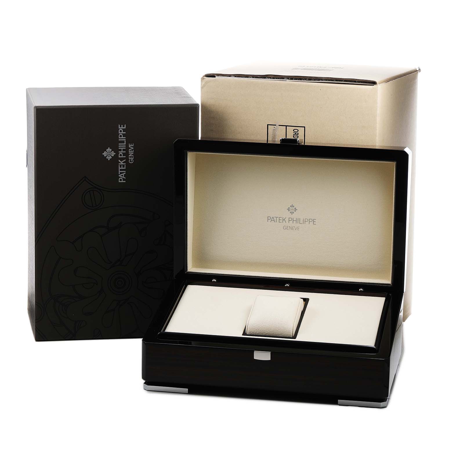 The image shows the open box of a Patek Philippe Complications 5396R-001 Men's Rose Gold Silver Dial watch with packaging, highlighting the elegant interior.