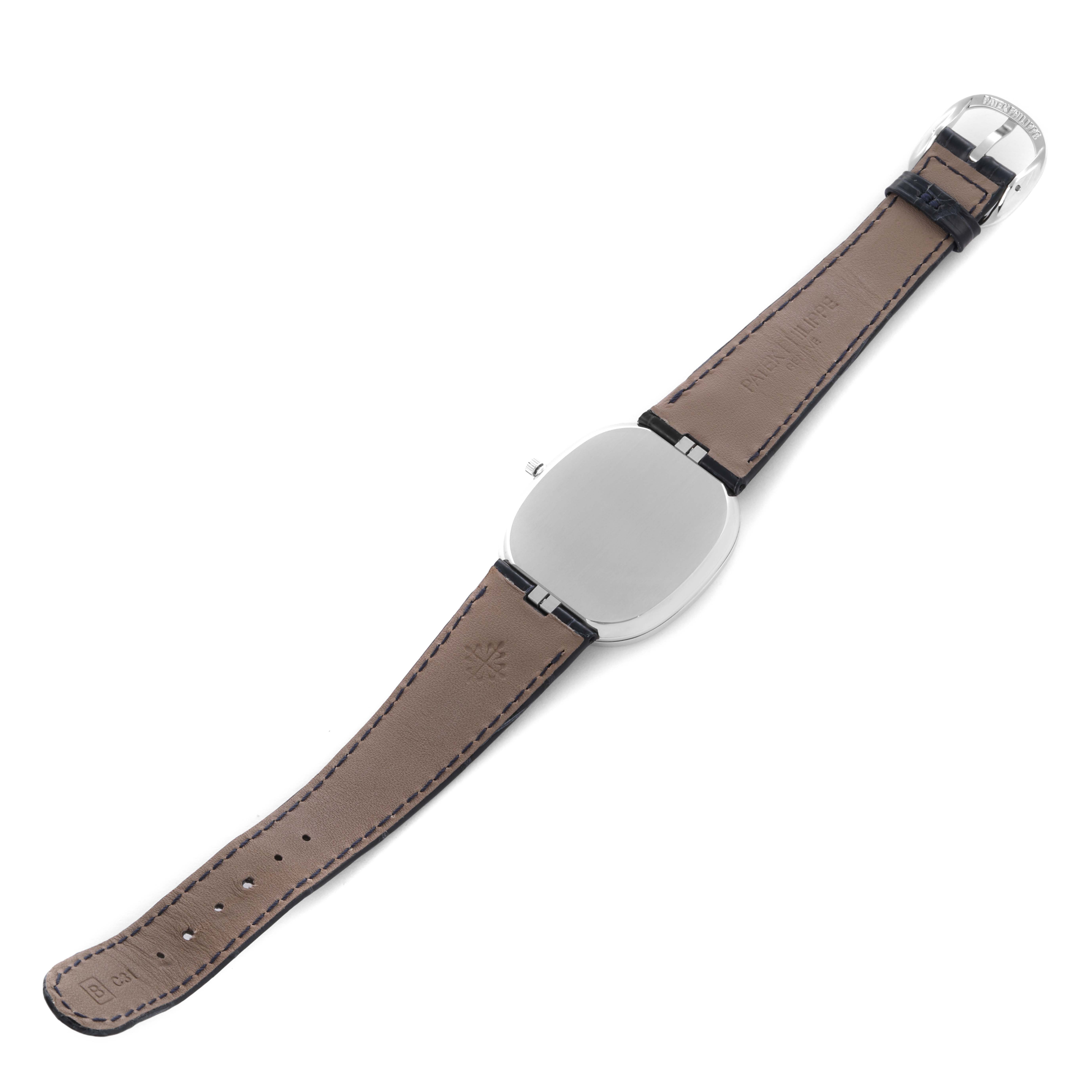 The Patek Philippe Golden Ellipse 5738P-001 Men's Platinum Blue Dial 5738P-001 Men's Platinum Blue Dial watch is shown from the back, displaying its strap and case back.