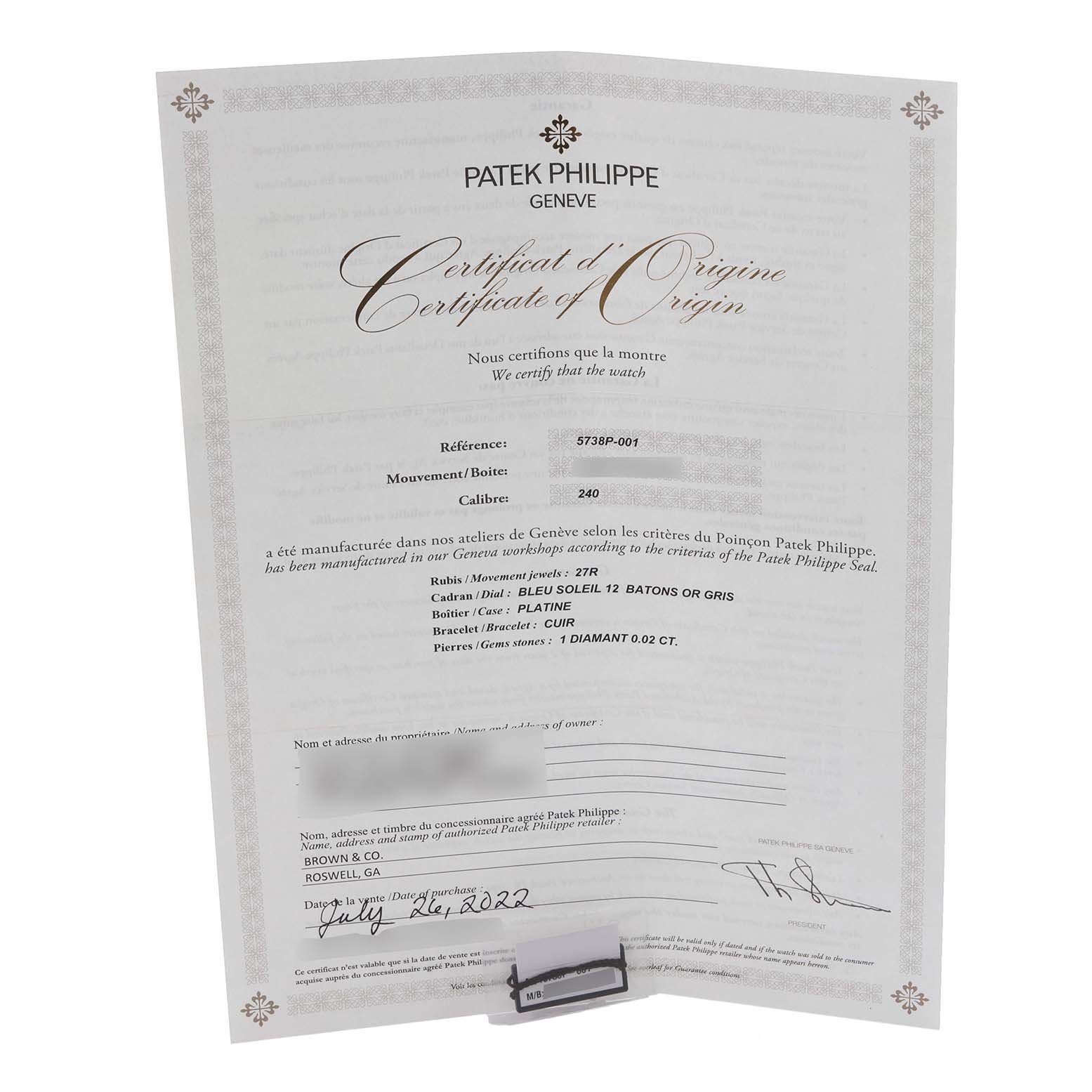 The image shows a Patek Philippe Certificate of Origin for the Golden Ellipse model, displayed at a slight angle on a holder.