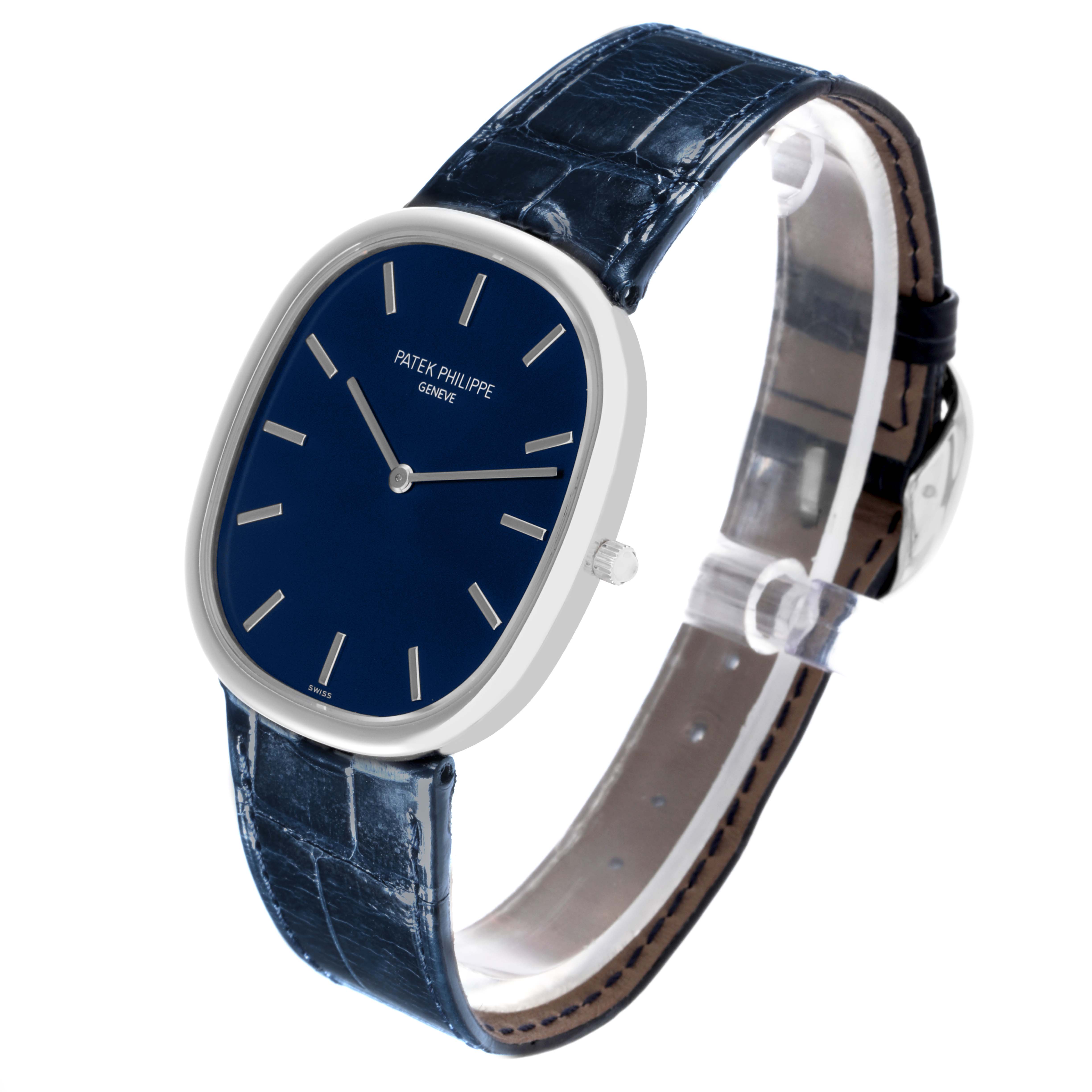 The Patek Philippe Golden Ellipse 5738P-001 Men's Platinum Blue Dial 5738P-001 Men's Platinum Blue Dial is shown at a slightly angled side view, displaying the face, strap, and clasp.