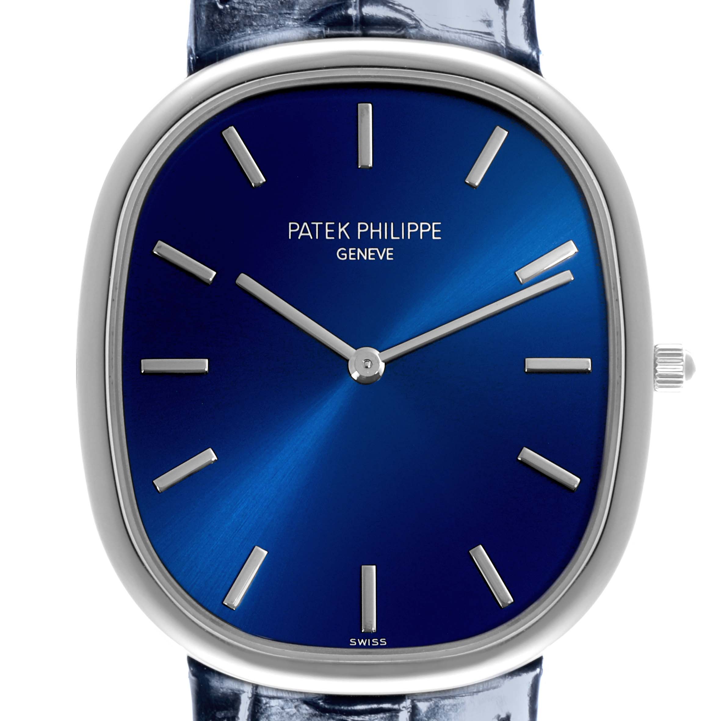 The image shows a front view of the Patek Philippe Golden Ellipse 5738P-001 Men's Platinum Blue Dial 5738P-001 Men's Platinum Blue Dial watch, highlighting the blue dial and silver markers.
