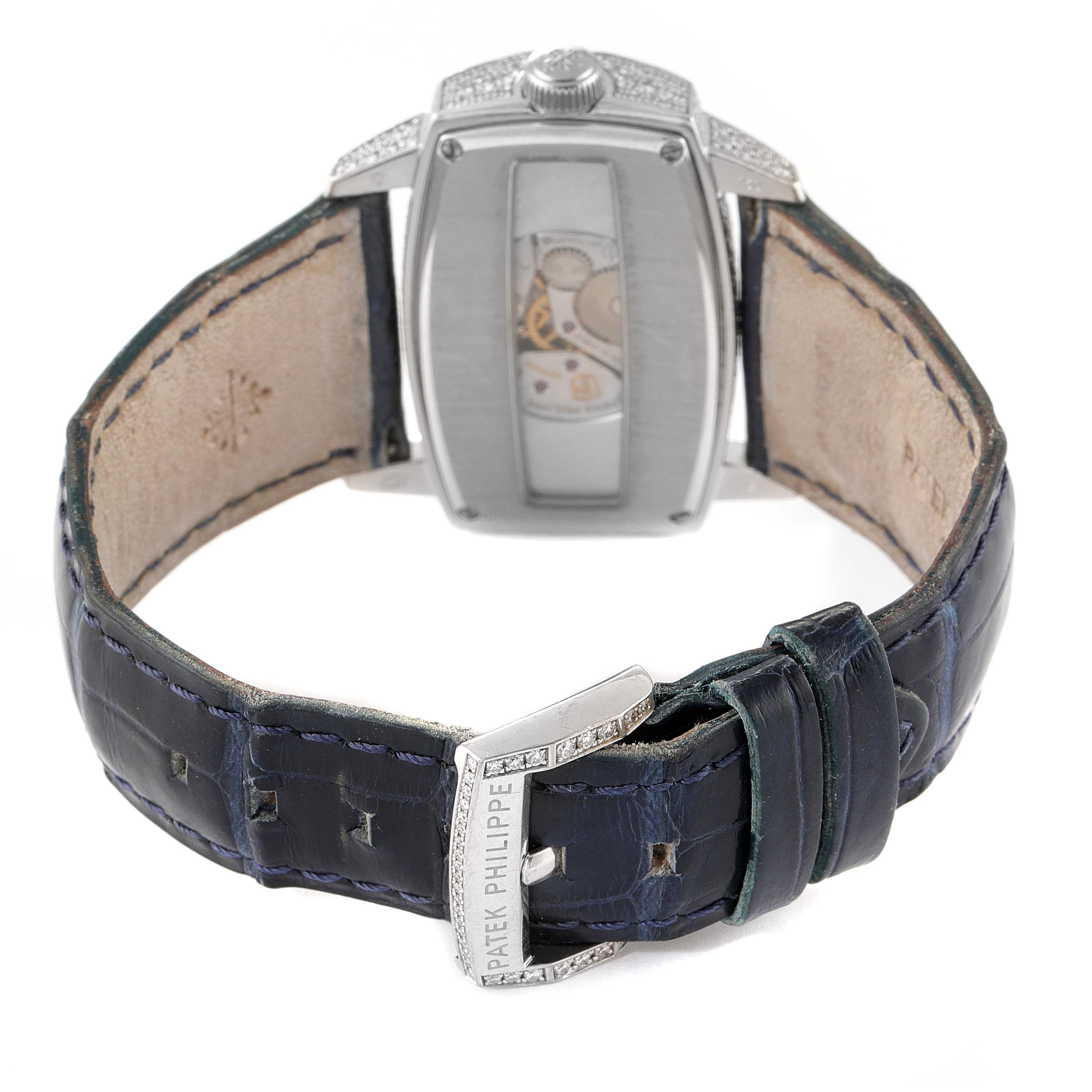 The image shows the back view of a Patek Philippe Gondolo 4992G Women's White Gold Mother of Pearl Dial 4992G Women's White Gold Mother of Pearl Dial watch, highlighting its movement through a transparent case back and leather strap.