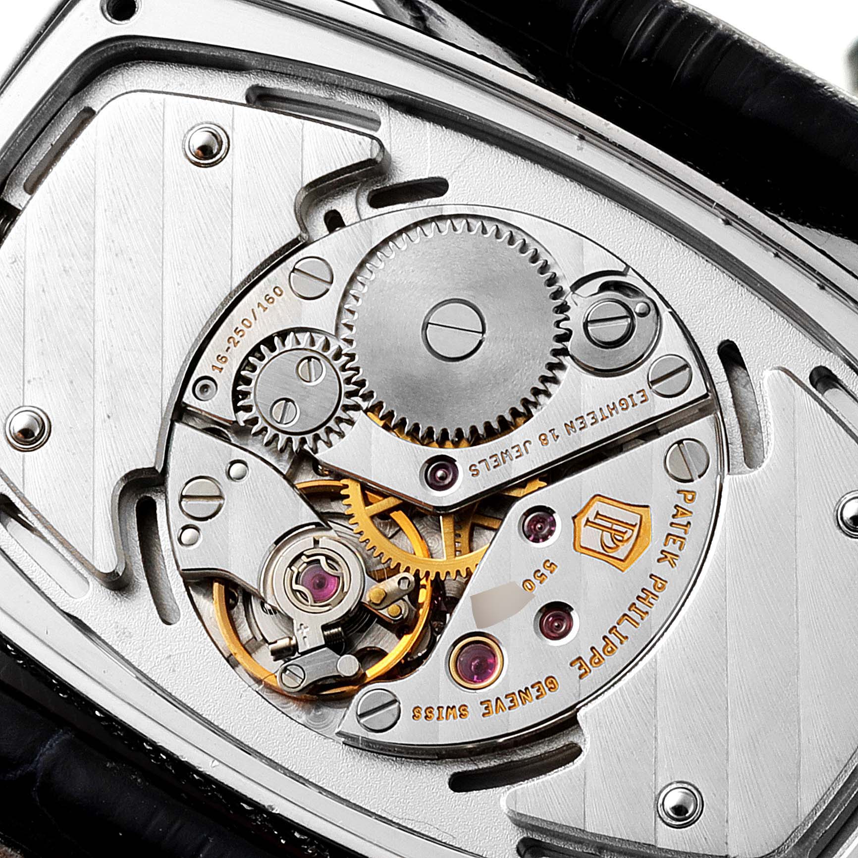 This image shows the back view of the Patek Philippe Gondolo 4992G Women's White Gold Mother of Pearl Dial 4992G Women's White Gold Mother of Pearl Dial watch, highlighting its intricate mechanical movement.