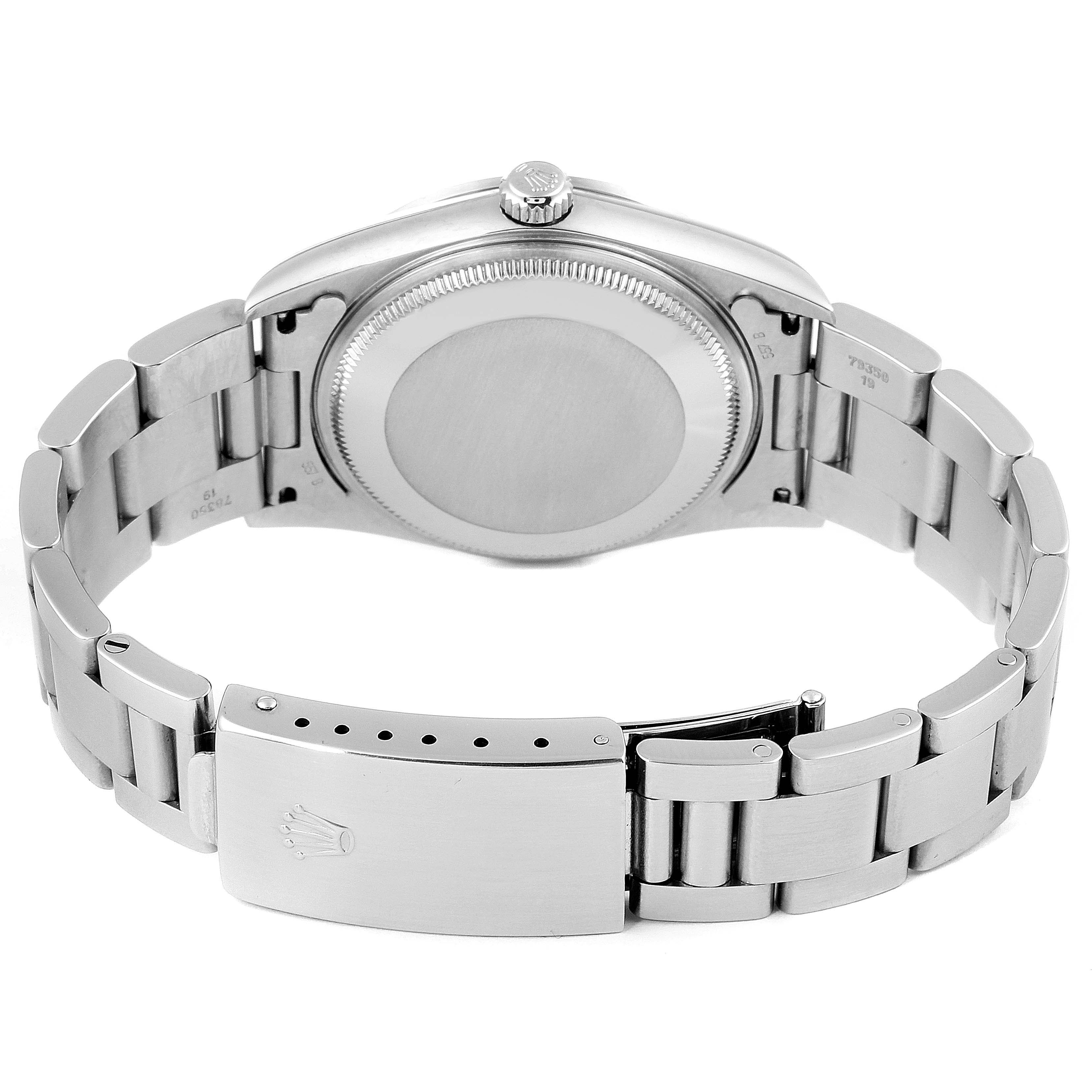 This image shows the backside of the Rolex Air-King 14000 Men's Stainless Steel Pink Dial 14000 Men's Stainless Steel Pink Dial watch, highlighting the case back, crown, and clasp.