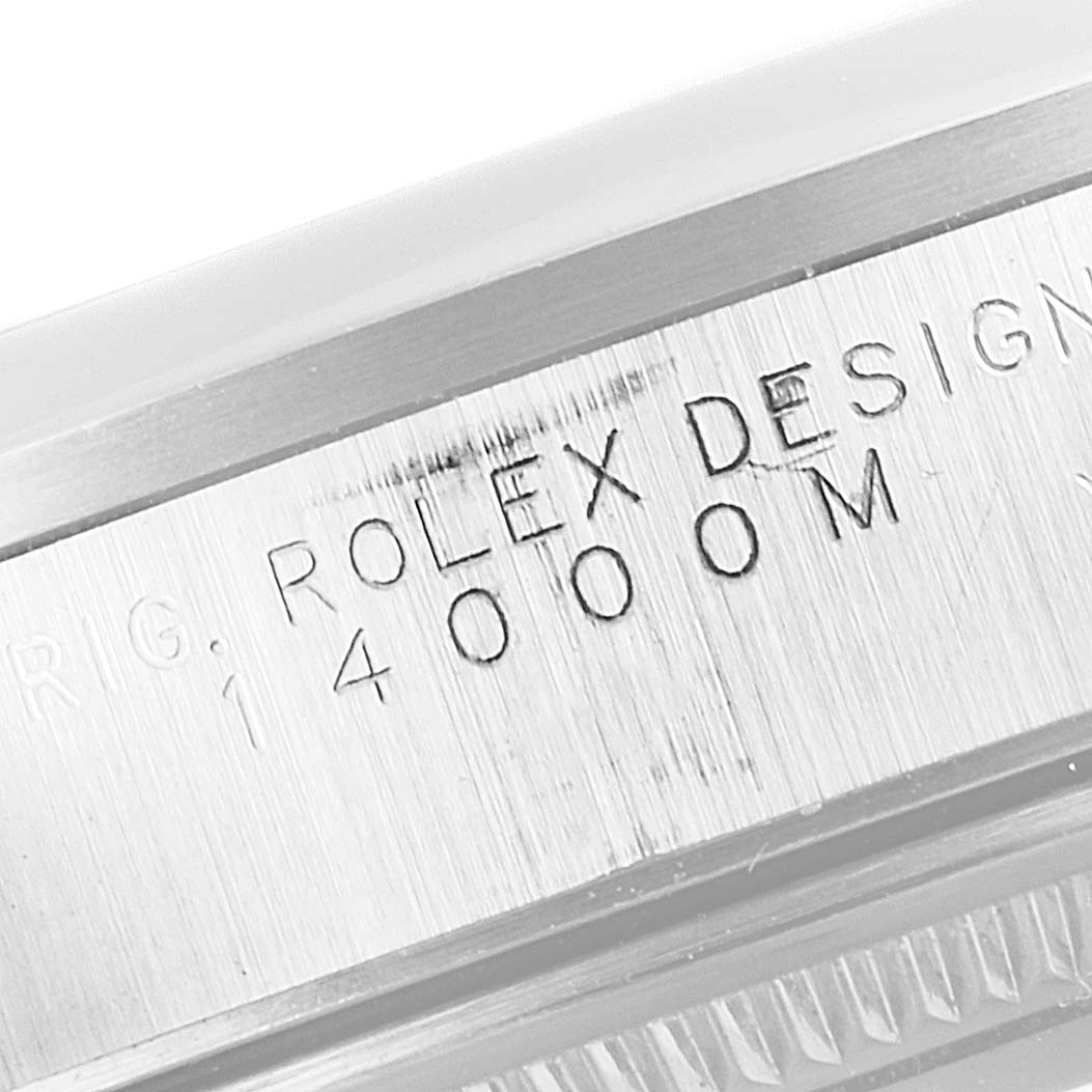 This image shows a close-up of the engravings on the side of a Rolex Air-King 14000 Men's Stainless Steel Pink Dial 14000 Men's Stainless Steel Pink Dial watch case.