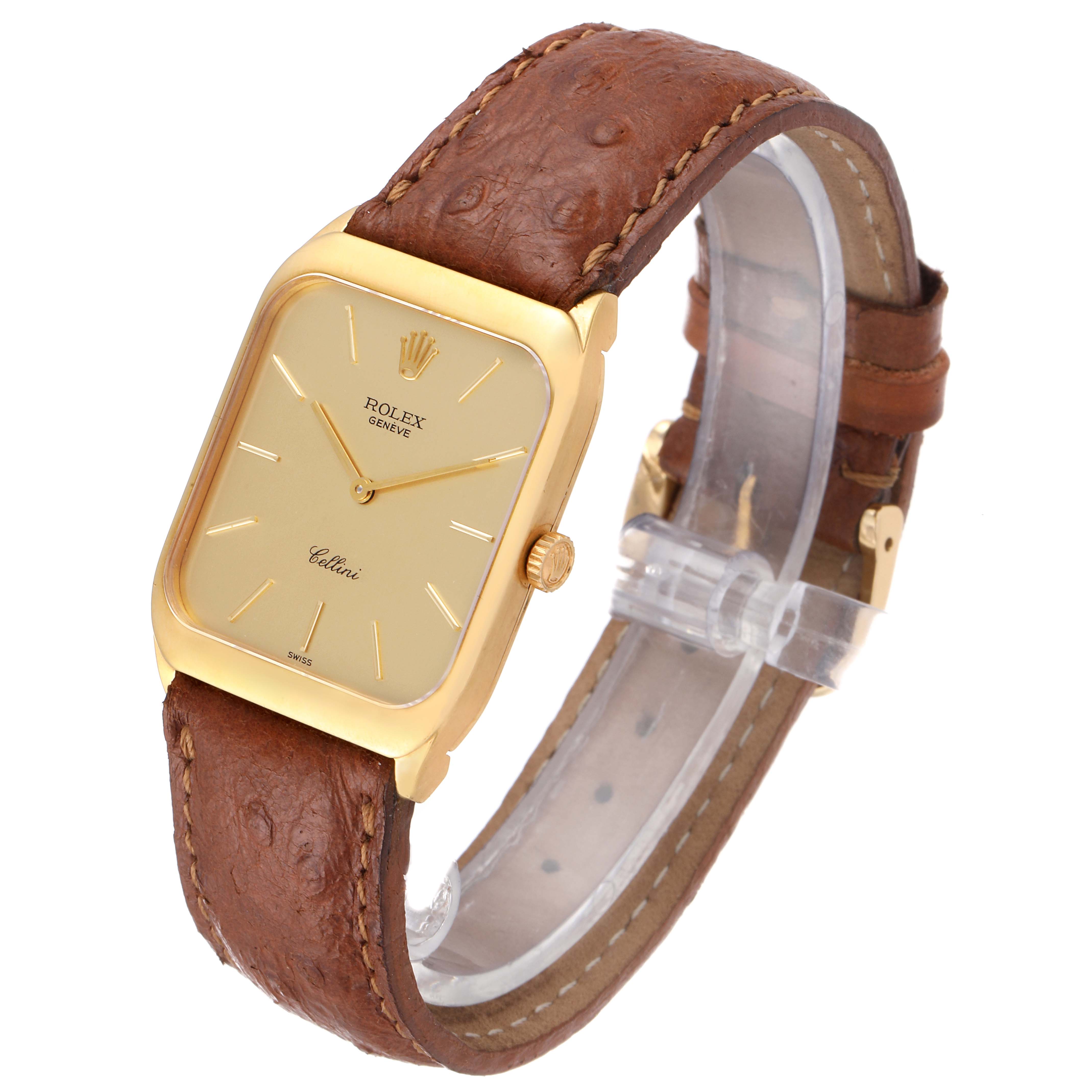 The image shows a Vintage Collection model by Rolex from a front diagonal angle, highlighting its gold case and brown leather strap.
