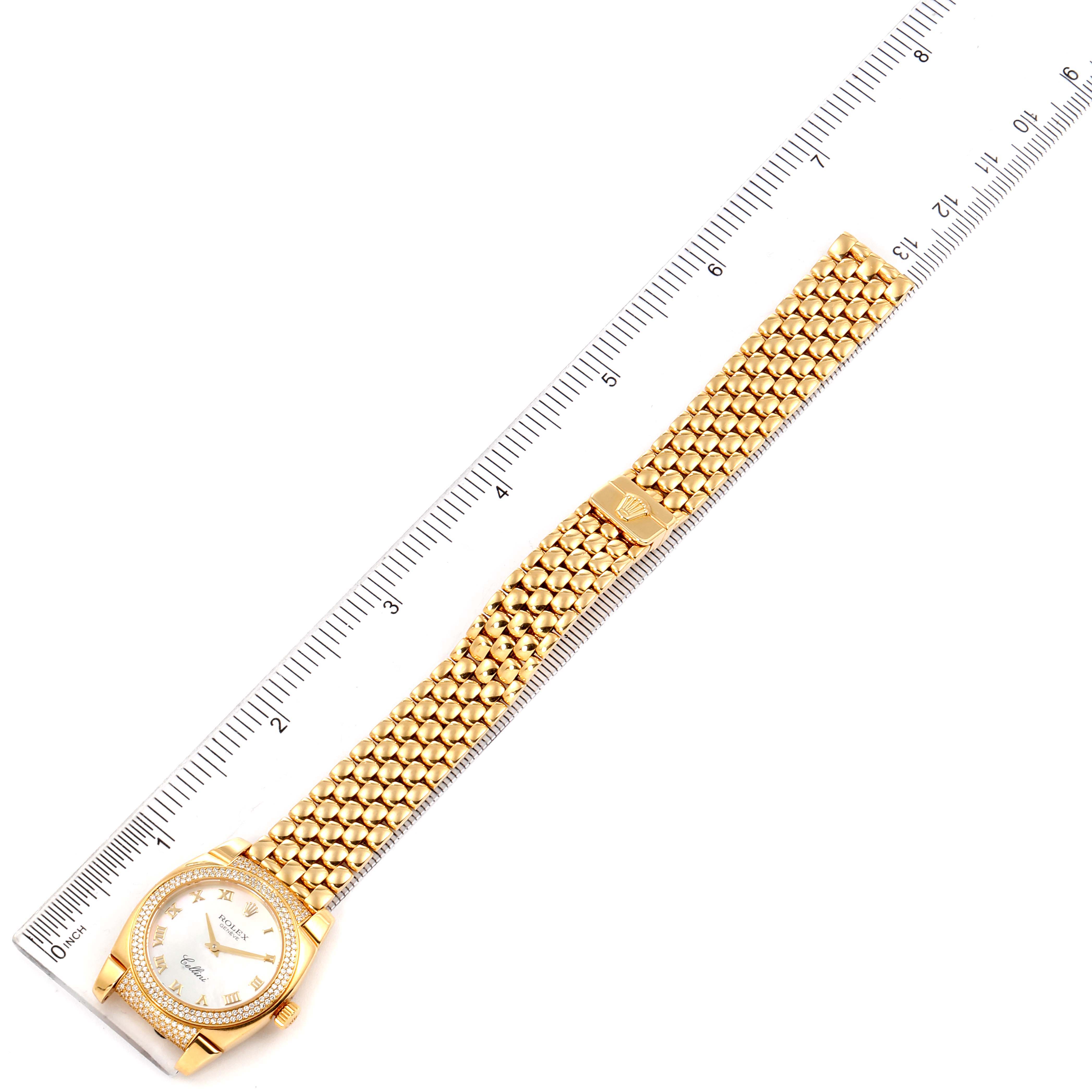 The image shows a Rolex Cellini 6311 Women's Yellow Gold Champagne Dial 6311 Women's Yellow Gold Champagne Dial watch with a gold bracelet, laid flat next to a ruler for measurement.