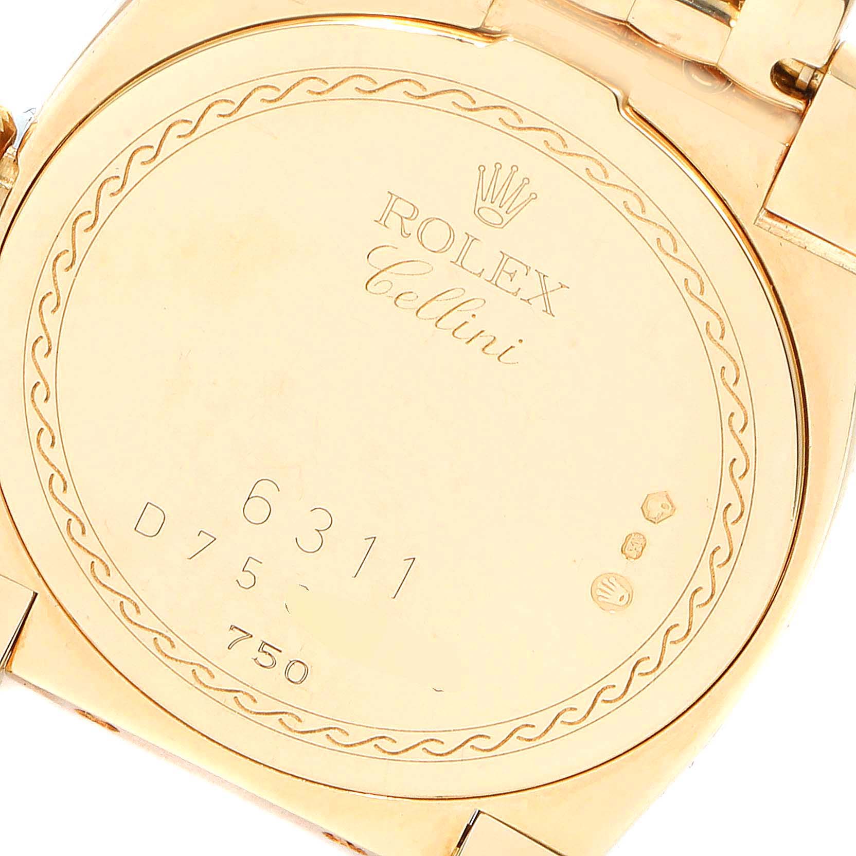 The image shows the case back of a Rolex Cellini 6311 Women's Yellow Gold Champagne Dial 6311 Women's Yellow Gold Champagne Dial watch viewed from above, displaying the model number and branding.
