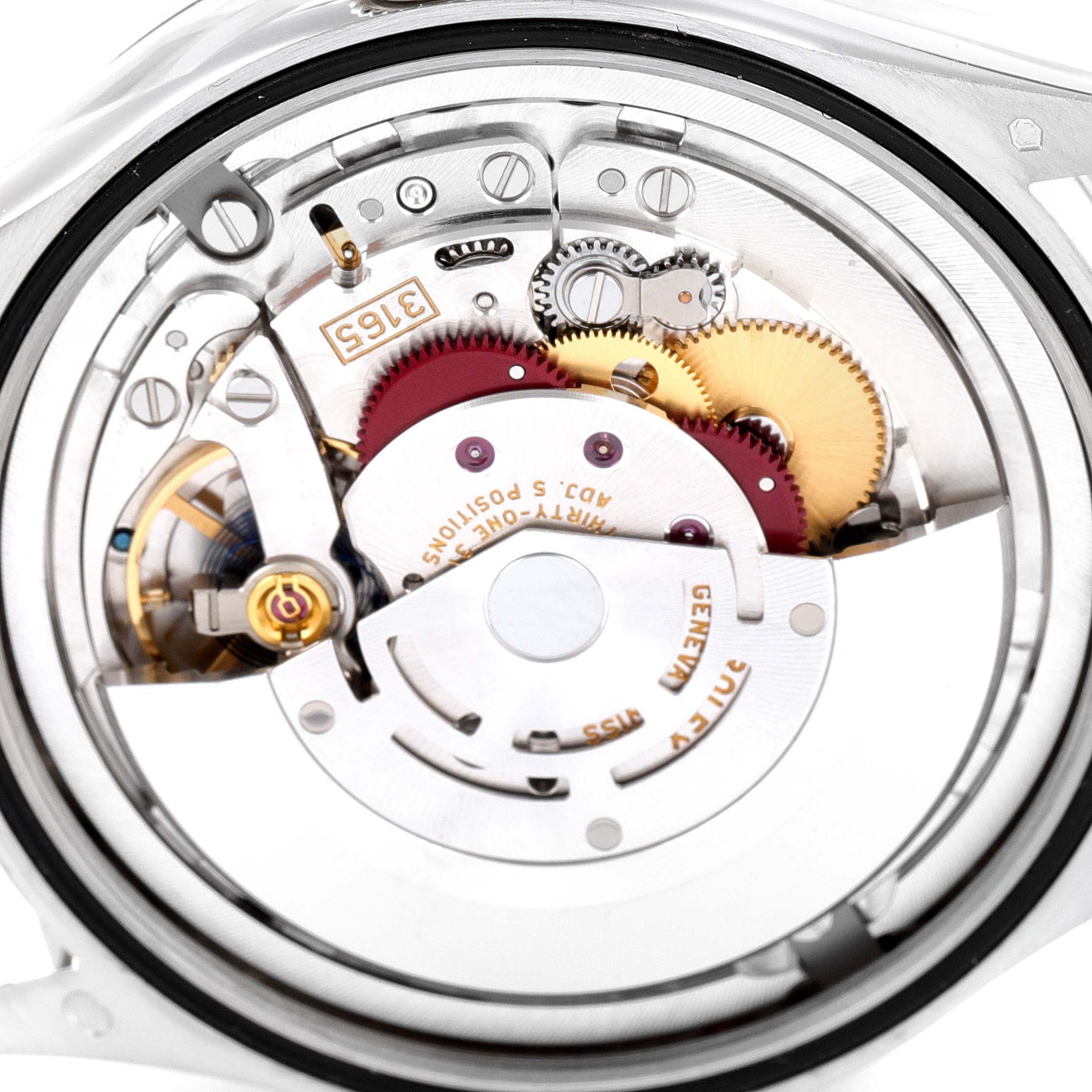 This image shows a close-up, angled view of the movement and internal mechanical components of a Rolex Cellini 50519 Men's White Gold Blue Dial 50519 Men's White Gold Blue Dial watch.