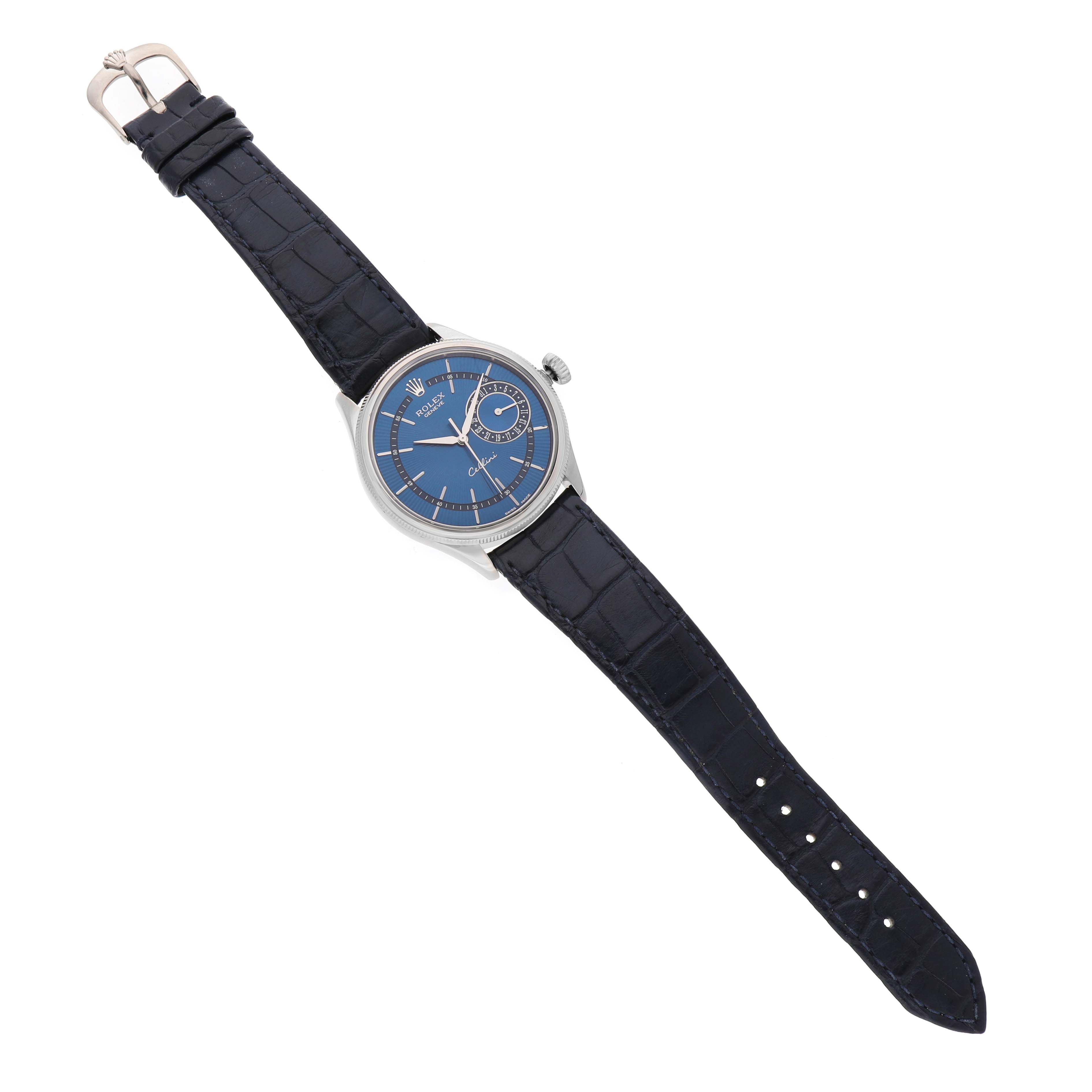 The Rolex Cellini 50519 Men's White Gold Blue Dial watch is shown from a top-down angle, displaying the blue dial, silver case, and black leather strap.