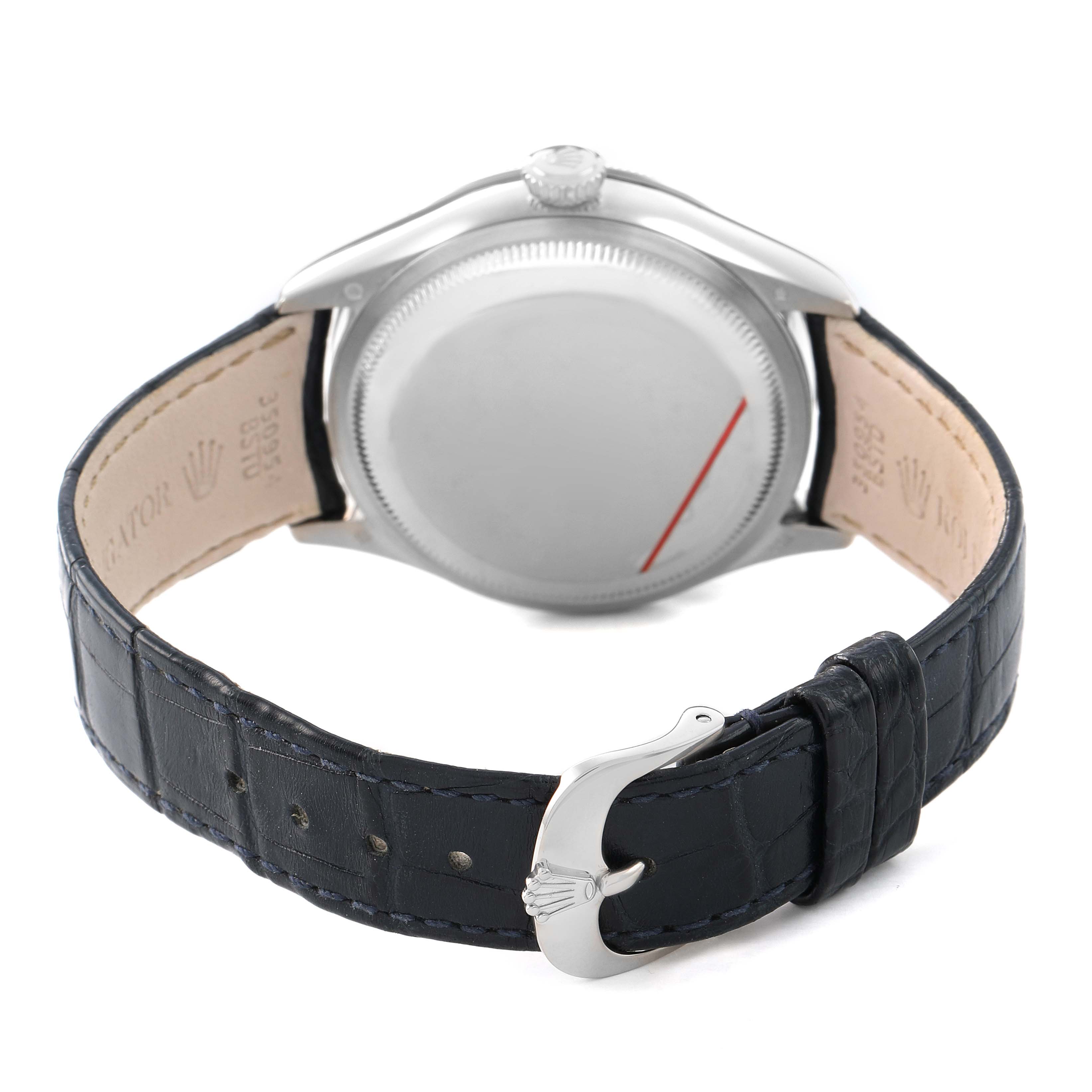 The Rolex Cellini 50519 Men's White Gold Blue Dial watch is shown from the back, highlighting the case back, crown, and the leather strap with a clasp.