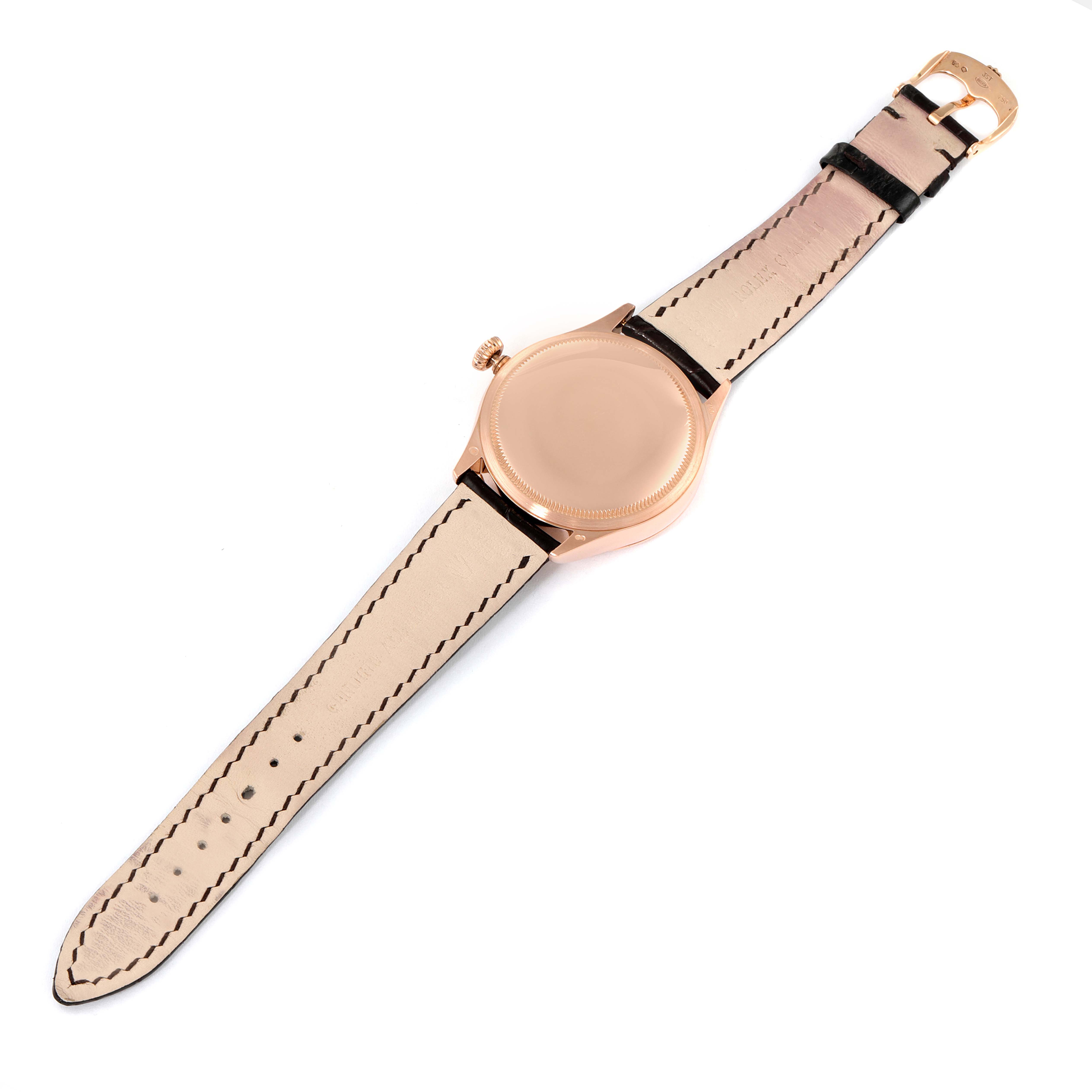 This image shows the back and the leather strap of a Rolex Cellini 50525 Men's Rose Gold Brown Dial 50525 Men's Rose Gold Brown Dial watch from a top-down angle.