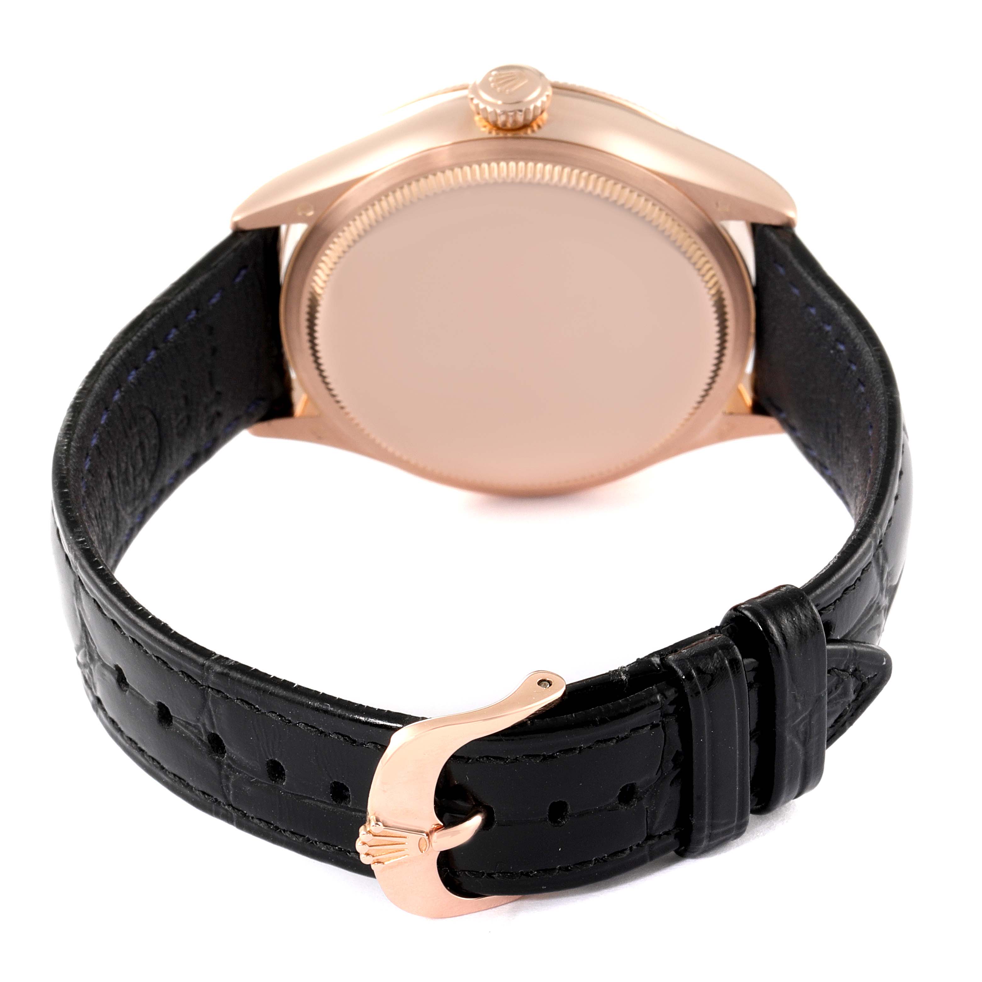 This image shows the backside and clasp of a Rolex Cellini 50525 Men's Rose Gold Black Dial 50525 Men's Rose Gold Black Dial watch, highlighting the strap and buckle.