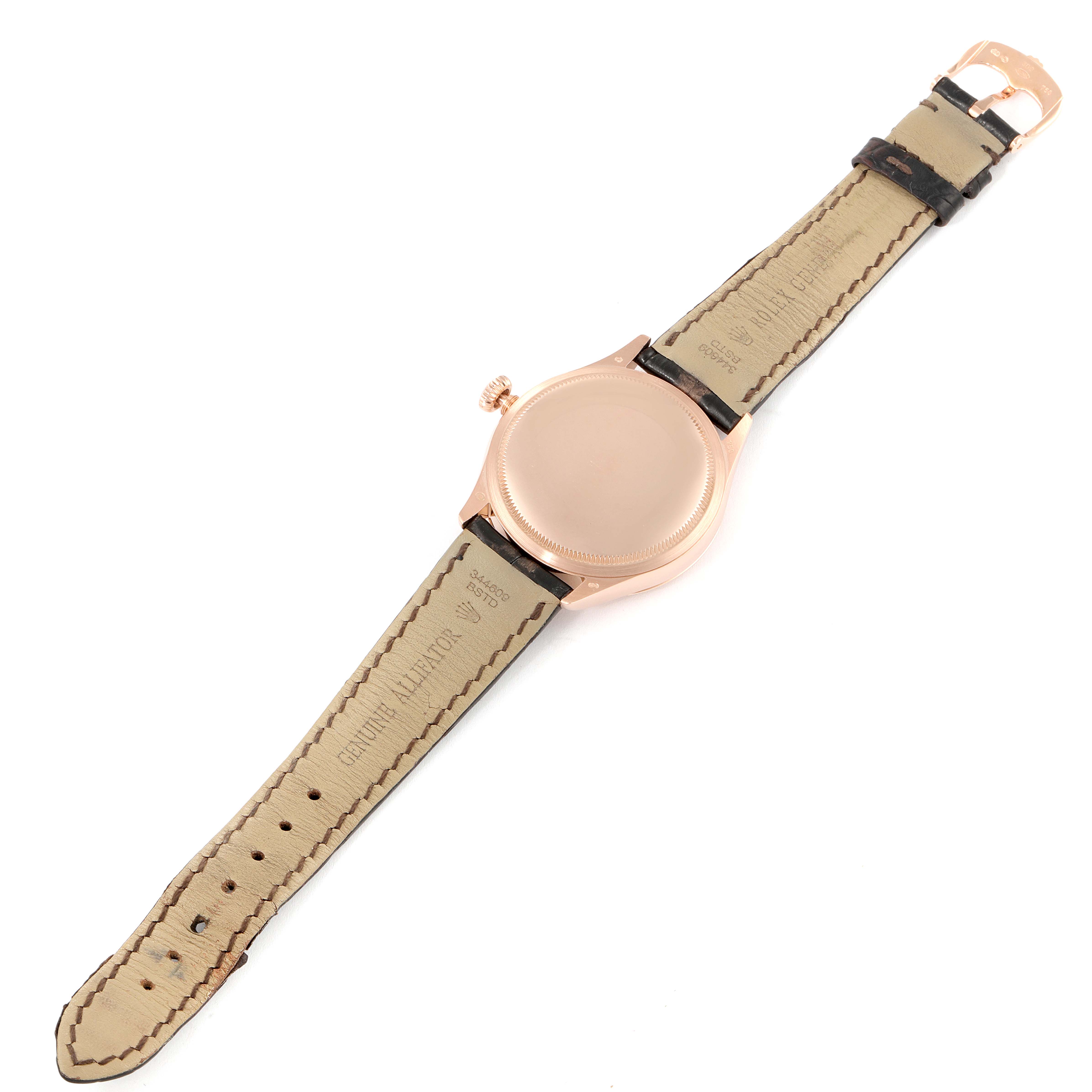 This image shows the back view of a Rolex Cellini 50505 Men's Rose Gold White Dial 50505 Men's Rose Gold White Dial watch, including the case, crown, and leather straps.