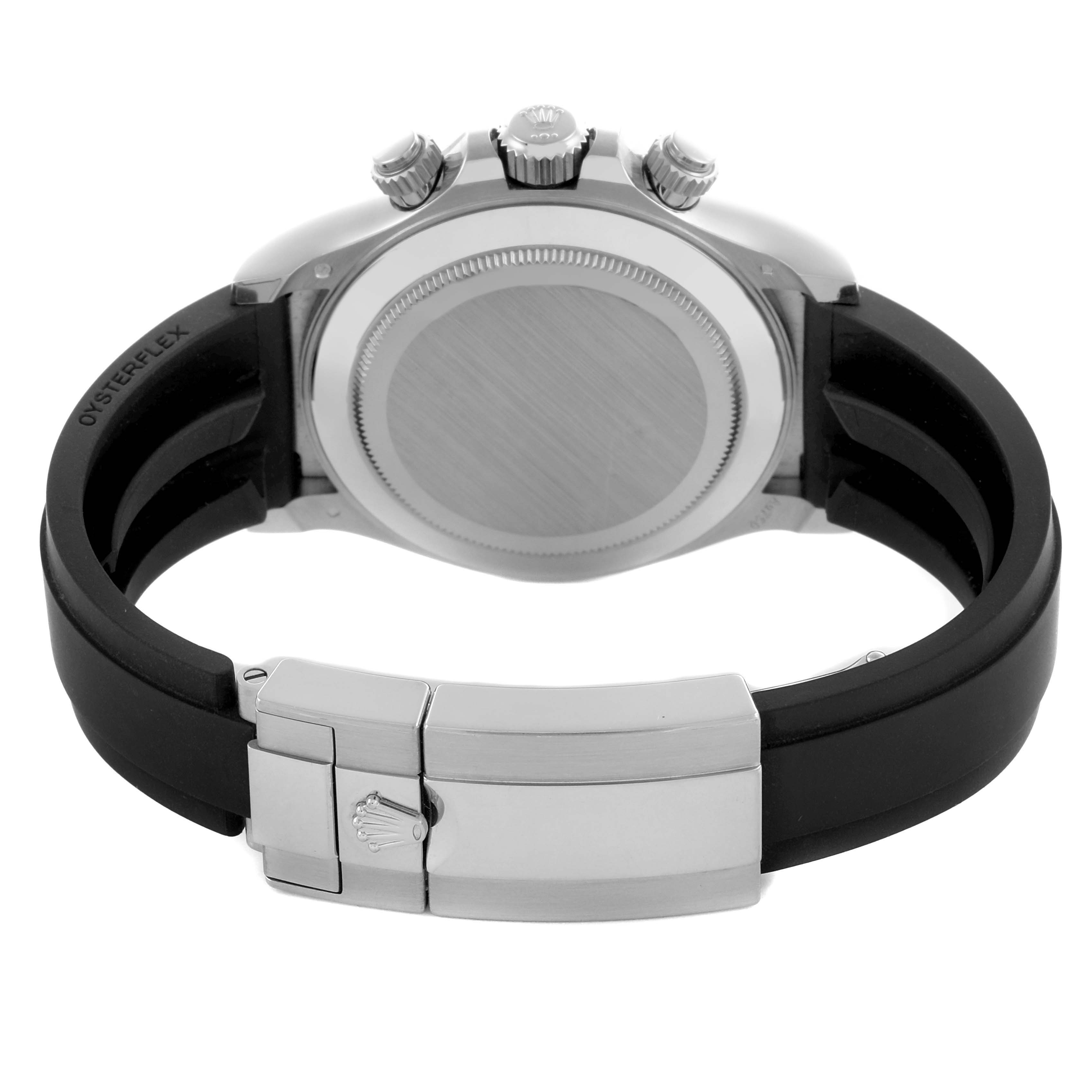 The image shows the back view of a Rolex Daytona 116519LN Men's White Gold Silver Dial 116519LN Men's White Gold Silver Dial watch, highlighting the case back, crown, and the clasp on the Oysterflex bracelet.