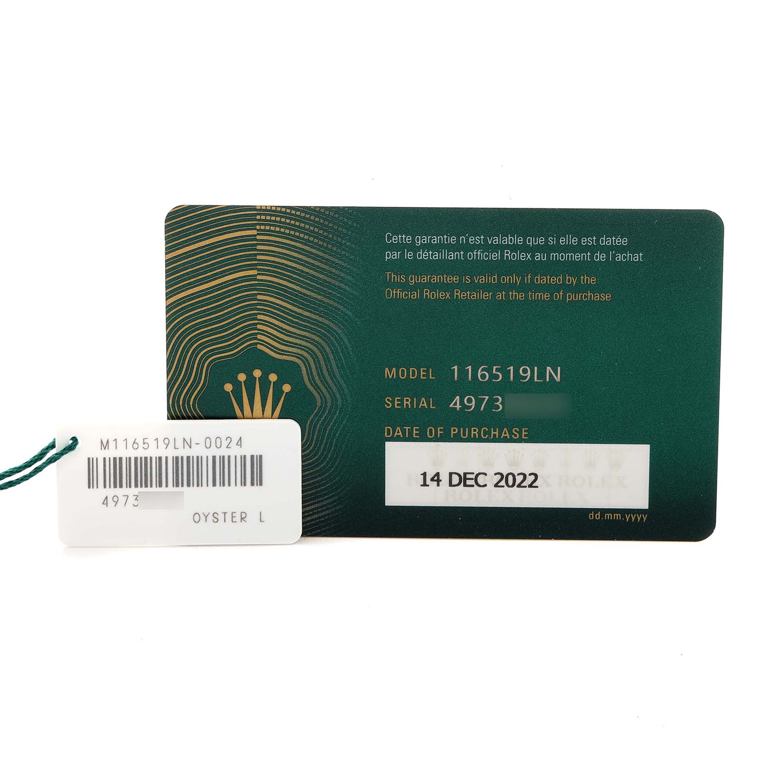 The image shows a Rolex Daytona 116519LN Men's White Gold Silver Dial 116519LN Men's White Gold Silver Dial model 116519LN warranty card and serial tag.