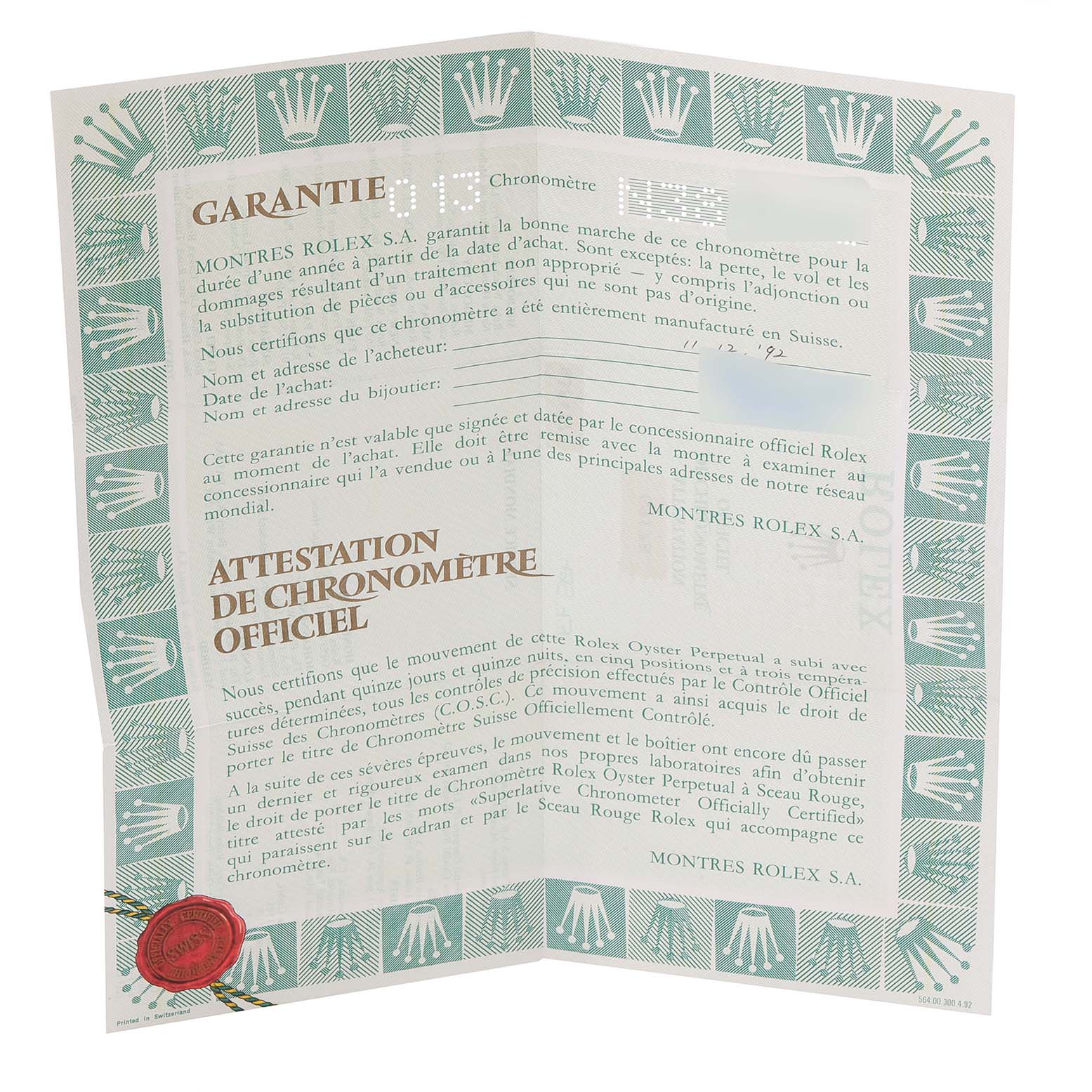 The image shows an open warranty card and official chronometer certification for a Rolex Datejust 69173 Women
s Steel and Gold (two tone) Champagne Dial 69173 Women
s Steel and Gold (two tone) Champagne Dial watch.