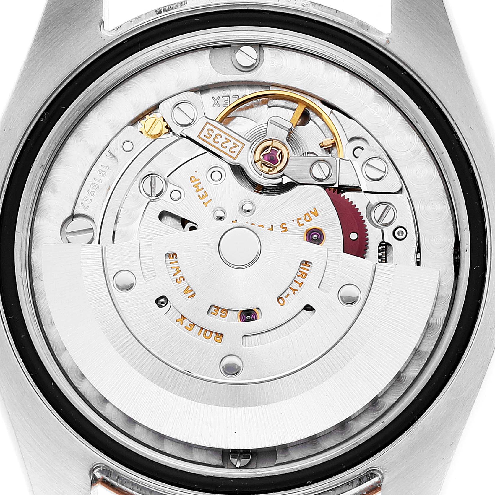 This image shows the back view of a Rolex Mid-Size 178241 Women
s Steel and Gold (two tone) Black Dial 178241 Women
s Steel and Gold (two tone) Black Dial model, focusing on the internal mechanical movement.