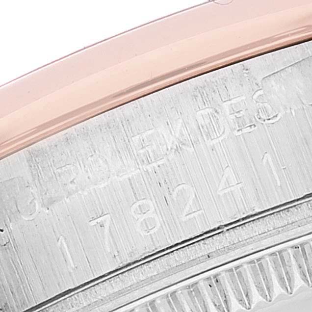 This close-up image shows the model number and part of the bezel and edge of a Rolex Mid-Size 178241 Women
s Steel and Gold (two tone) Black Dial 178241 Women
s Steel and Gold (two tone) Black Dial watch.