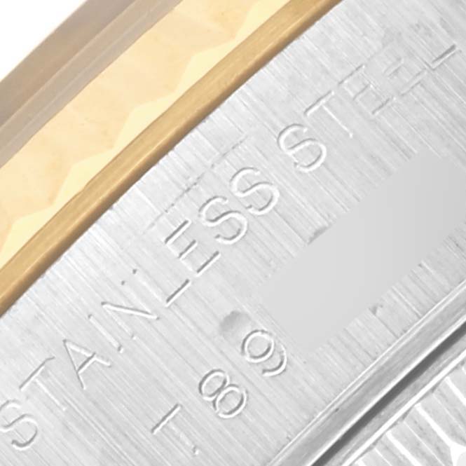 The image shows a close-up of the side engraving on the Rolex Datejust 69173 Women's Steel and Gold (two tone) Blue Dial 69173 Women's Steel and Gold (two tone) Blue Dial, revealing the "STAINLESS STEEL" marking.
