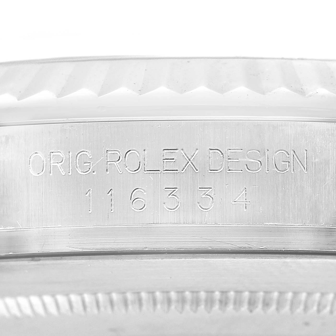 The image shows a close-up of the engraving on a Rolex Datejust 41 116334 Men's Stainless Steel Blue Dial's case side, highlighting the model number.