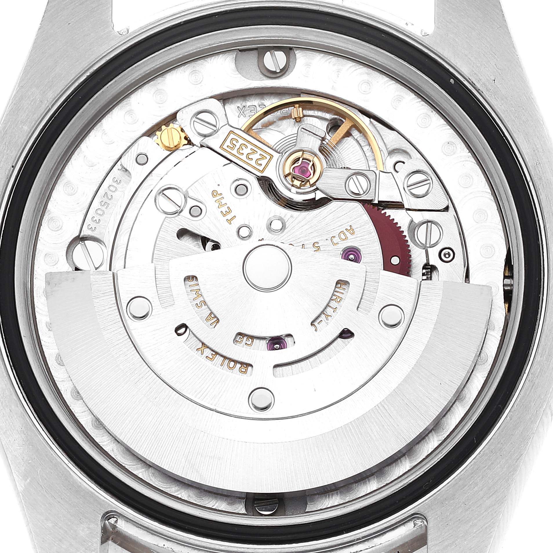 This image shows the internal mechanism of a Rolex Mid-Size 178384 Women's Stainless Steel Brown Dial 178384 Women's Stainless Steel Brown Dial watch, viewed from the back, highlighting the movement components and rotor.