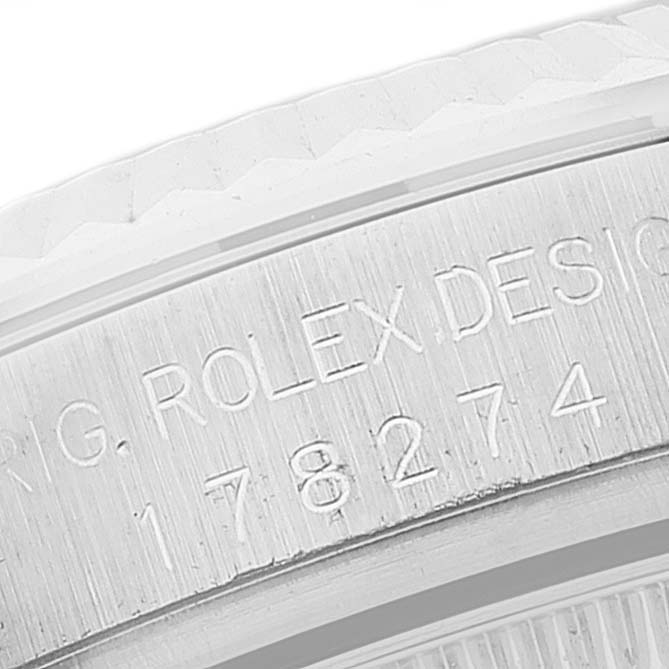 The image shows an engraved side view of the bezel and case of a Mid-Size Rolex watch.