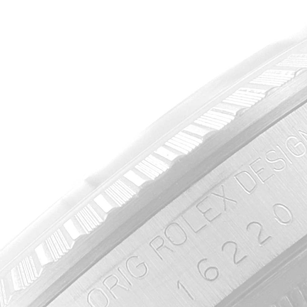 The image shows a close-up side view of the bezel and serial number of the Rolex Datejust 16220 Men's Stainless Steel Silver Dial 16220 Men's Stainless Steel Silver Dial watch.