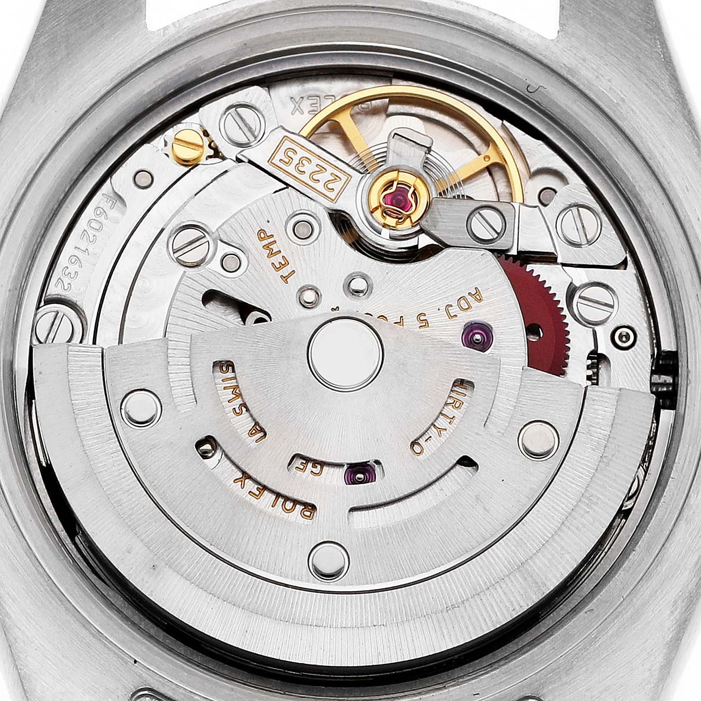 The image shows the back view of a Rolex Datejust 179171 Women's Steel and Gold (two tone) Black Dial, focusing on its intricate movement components.