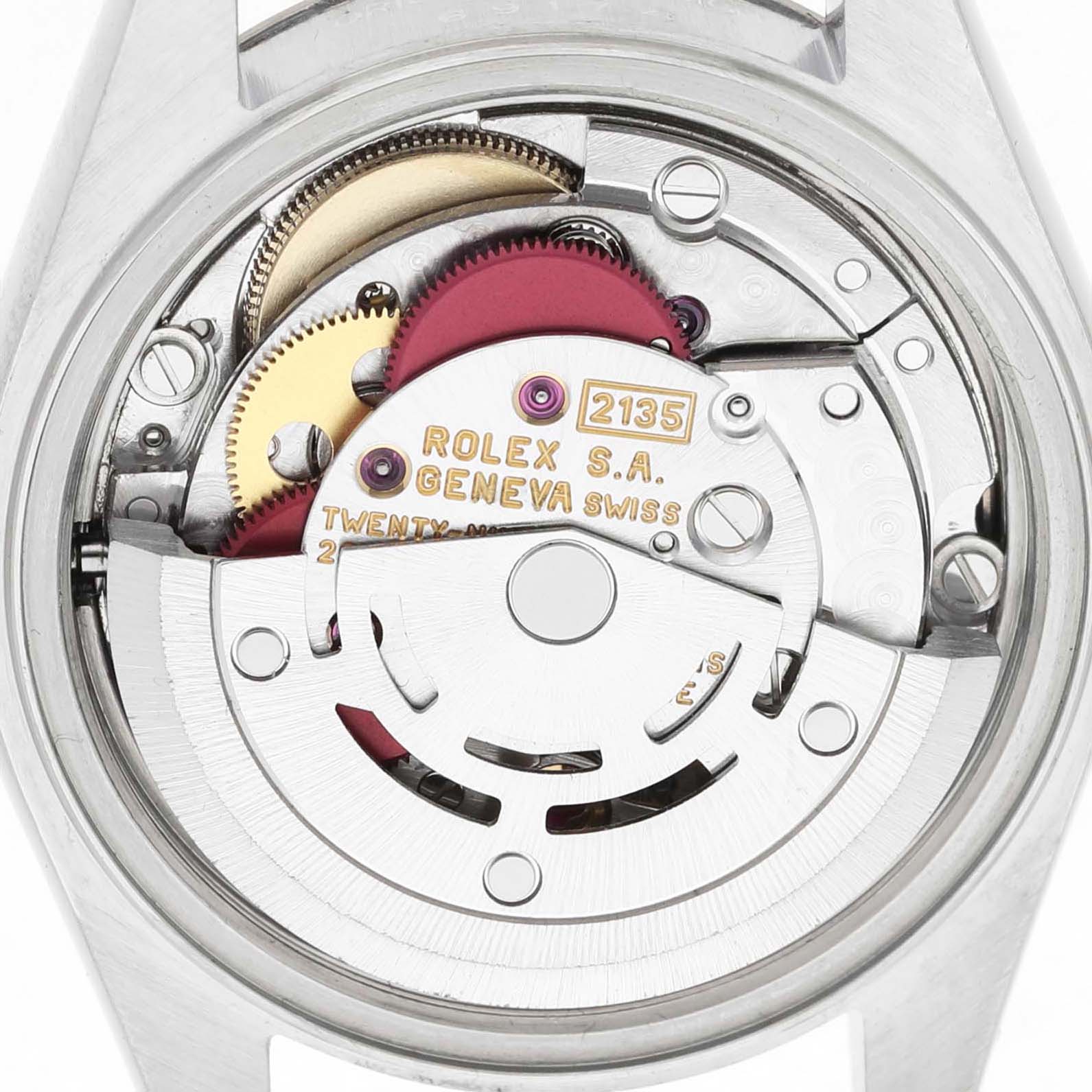 The image shows the back of a Rolex Datejust 69174 Women's Stainless Steel Silver Dial watch, revealing its internal mechanism and movement components.