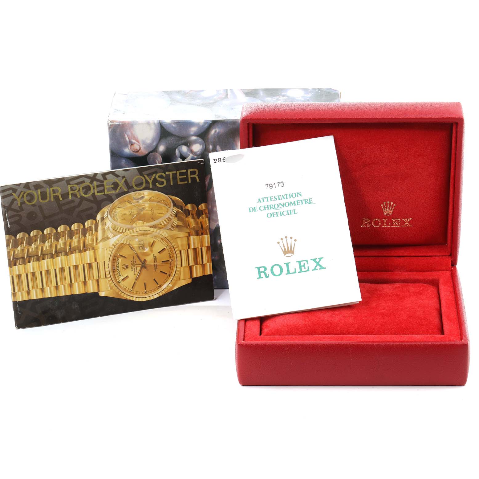 The image shows the packaging, user manual, and warranty card of a Rolex Datejust 79173 Women's Steel and Gold (two tone) Silver Dial 79173 Women's Steel and Gold (two tone) Silver Dial, with an empty red Rolex box.